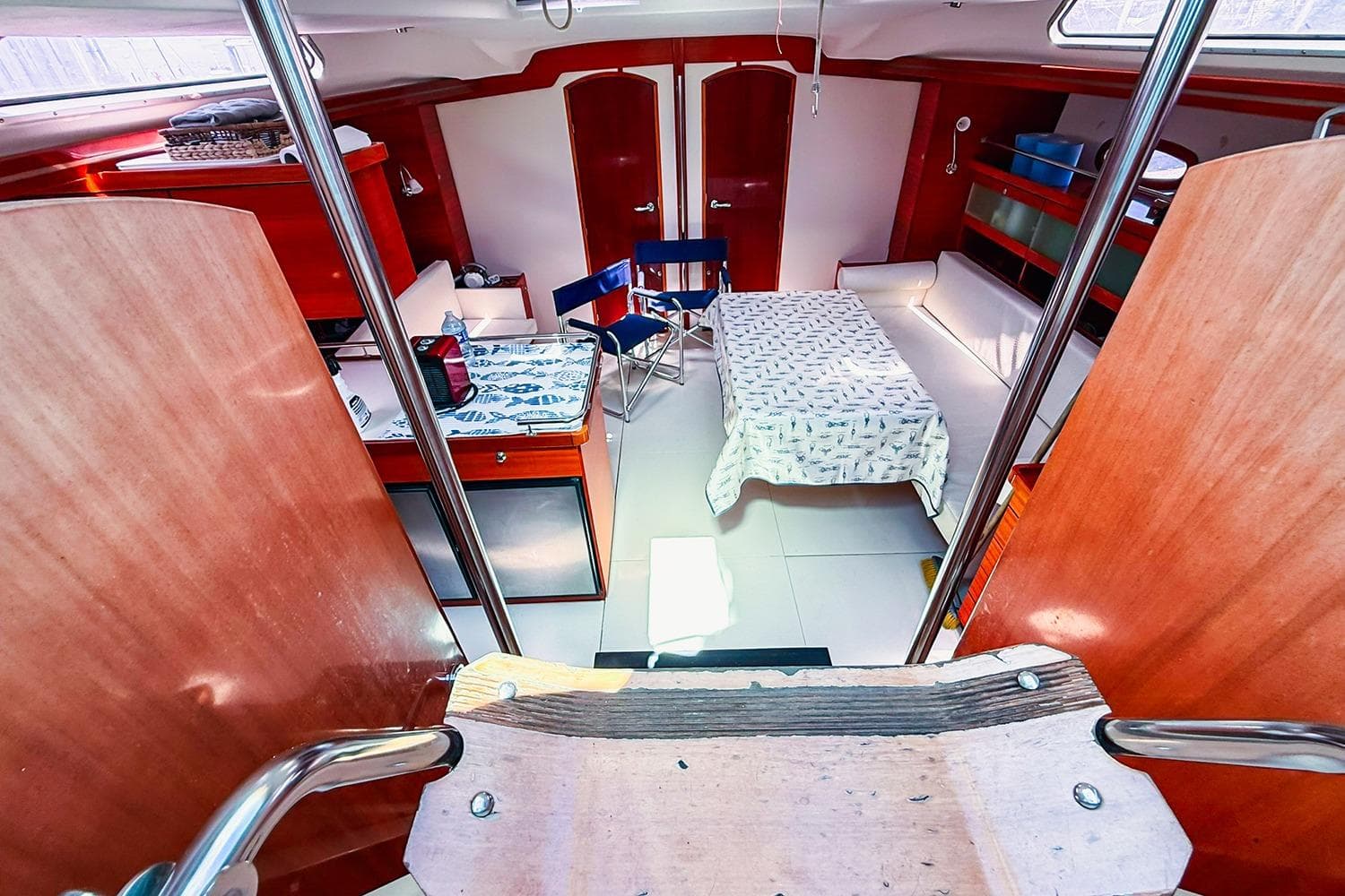 Interior of 2004 Hanse 531 yacht with cozy cabin and dining area.