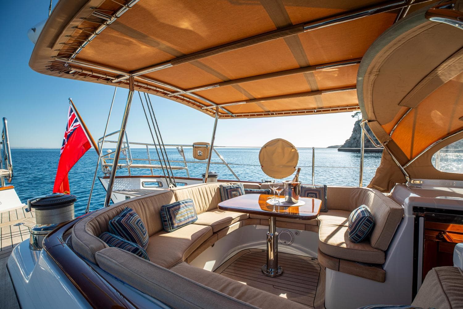 Luxurious deck on Alloy Yachts Cruising Ketch 1998, overlooking the sea.