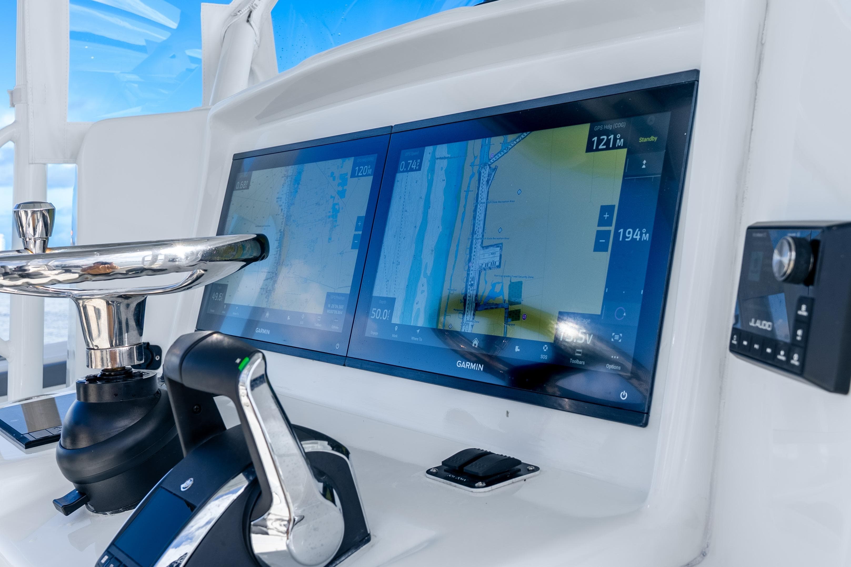 2015 Yellowfin 42 Offshore helm with dual Garmin displays and controls.