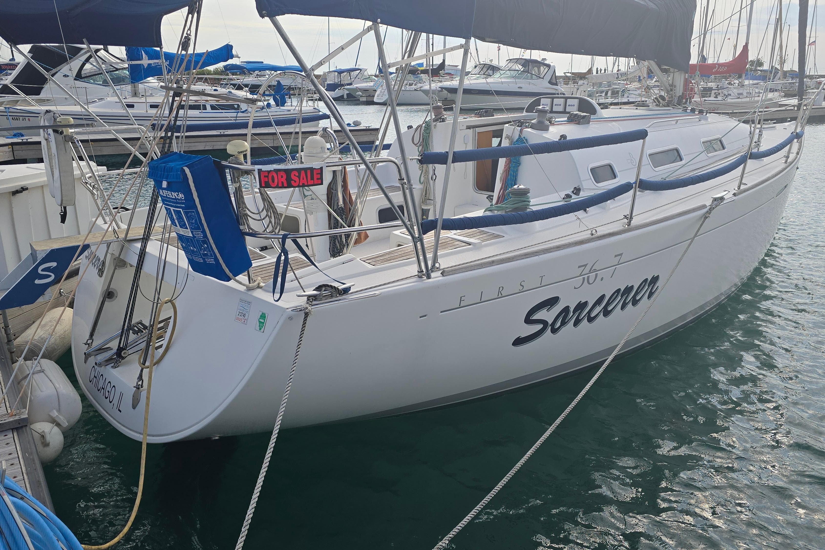 2003 Beneteau First 36.7 sailboat "Sorcerer" for sale, docked in marina.