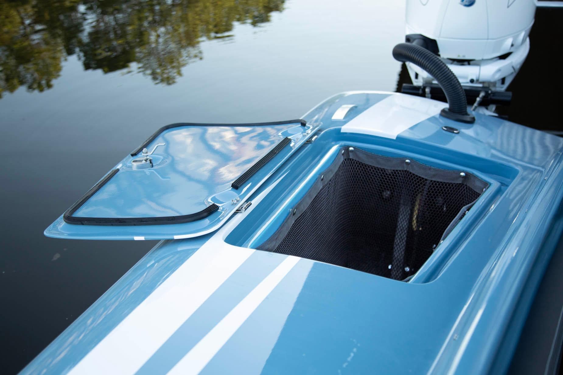2025 Fountain 34 Thunder Cat boat with open storage compartment.