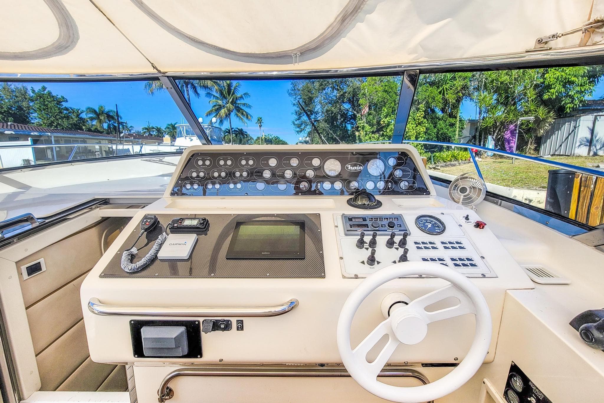 Cockpit of a 1998 Baia Sports Cruiser with steering wheel and instruments.