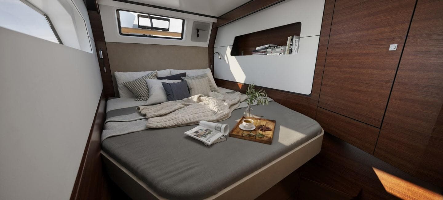 Luxurious bedroom interior of 2025 Nautitech 44 Open yacht with cozy bedding and modern design.