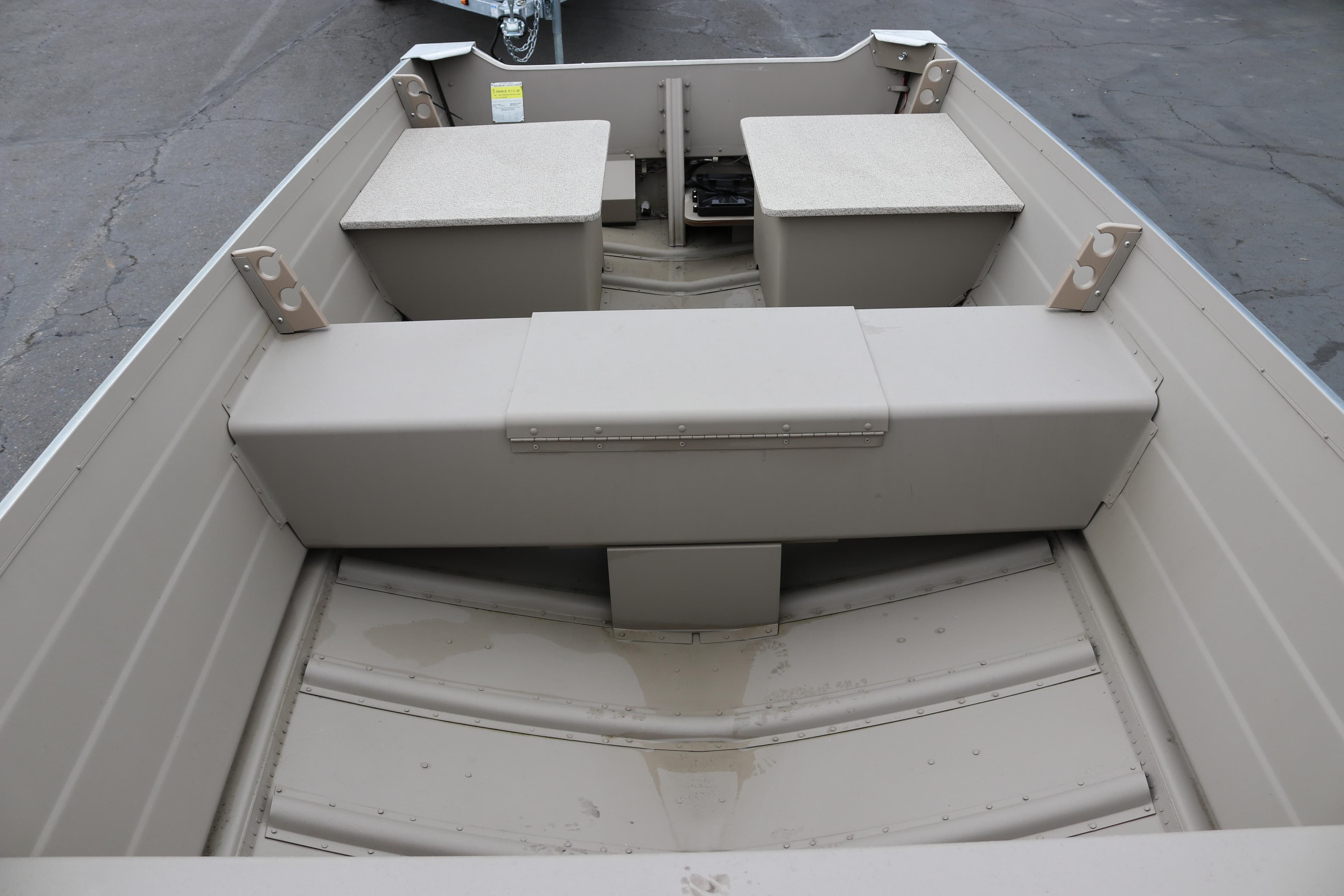 2025 Smoker Craft Voyager 16 interior with seating and storage compartments.