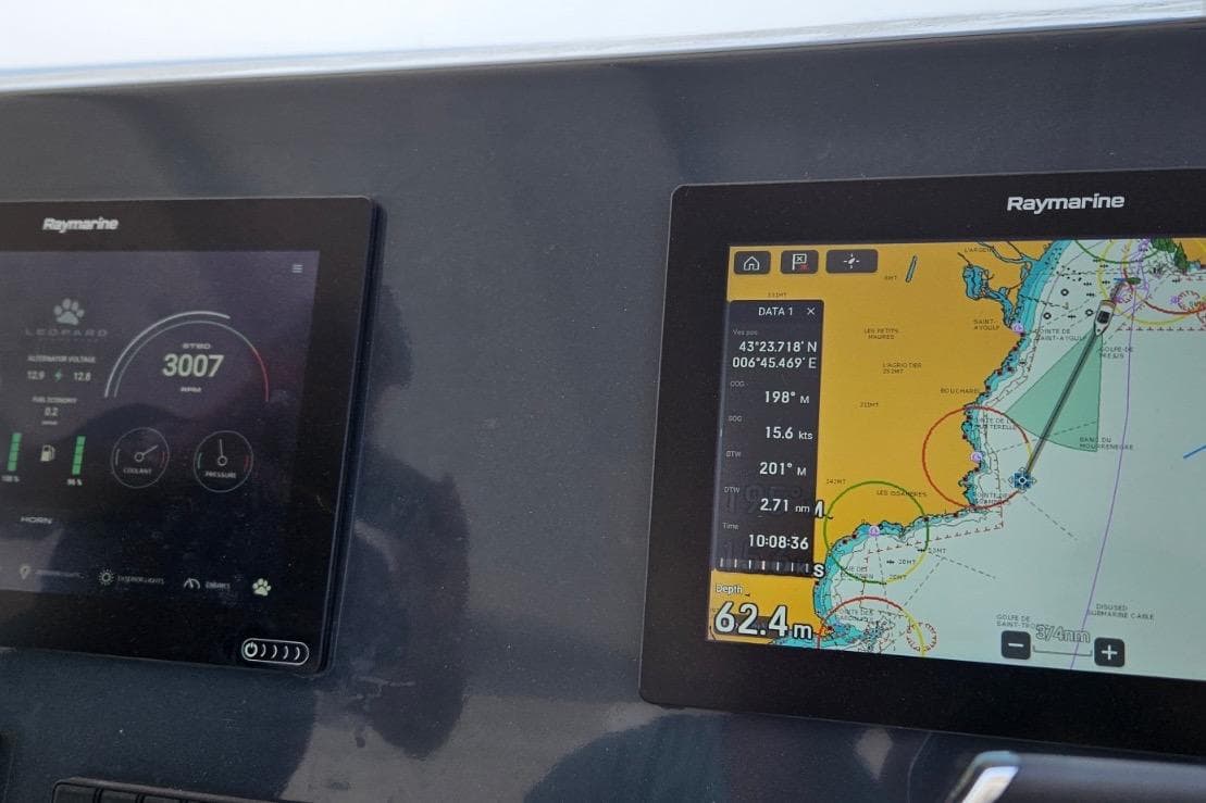 Leopard 40 Powercat 2023 navigation display with Raymarine screens showing speed and map.