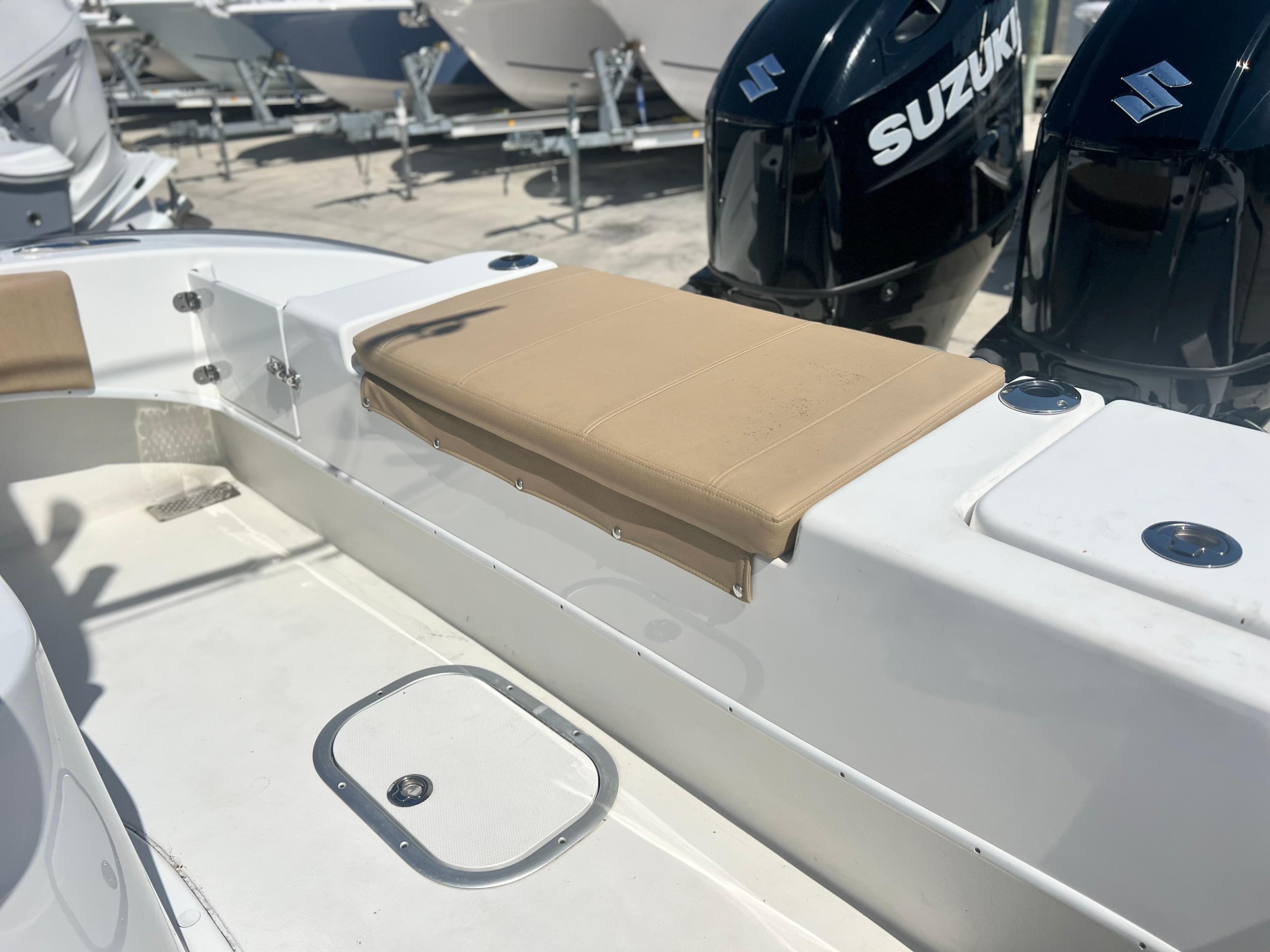 2022 Cape Horn 24 XS boat interior with seating and Suzuki engines.