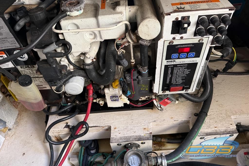 Engine compartment of a 2010 Sea Ray Sundancer 280 with Kohler generator.