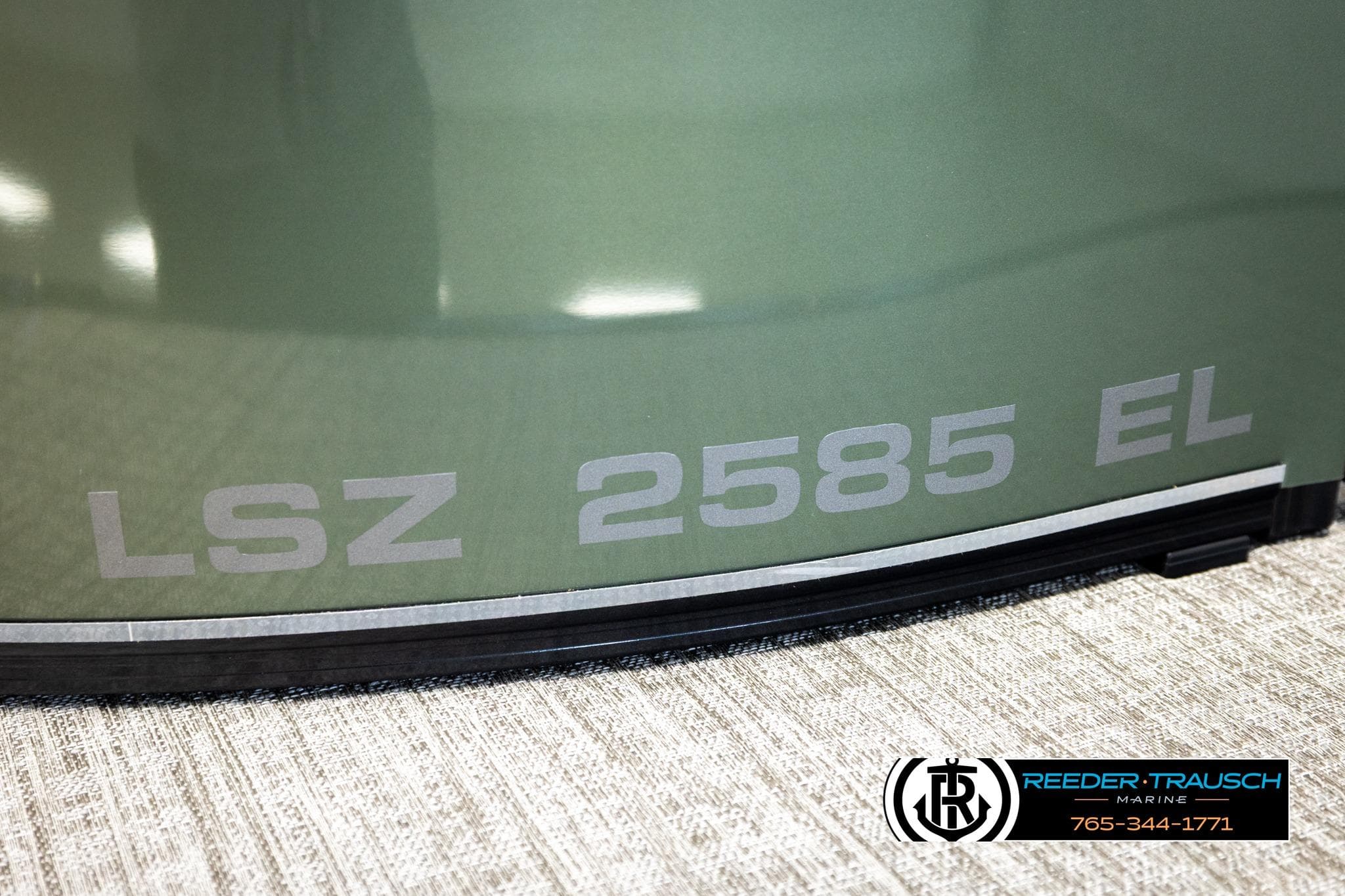 2026 Avalon LSZ EL boat with "LSZ 2585 EL" marking, Reeder-Trausch Marine logo visible.