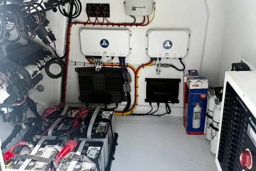 Electrical system setup in a 2022 Freeman 34VH boat, featuring batteries and wiring.