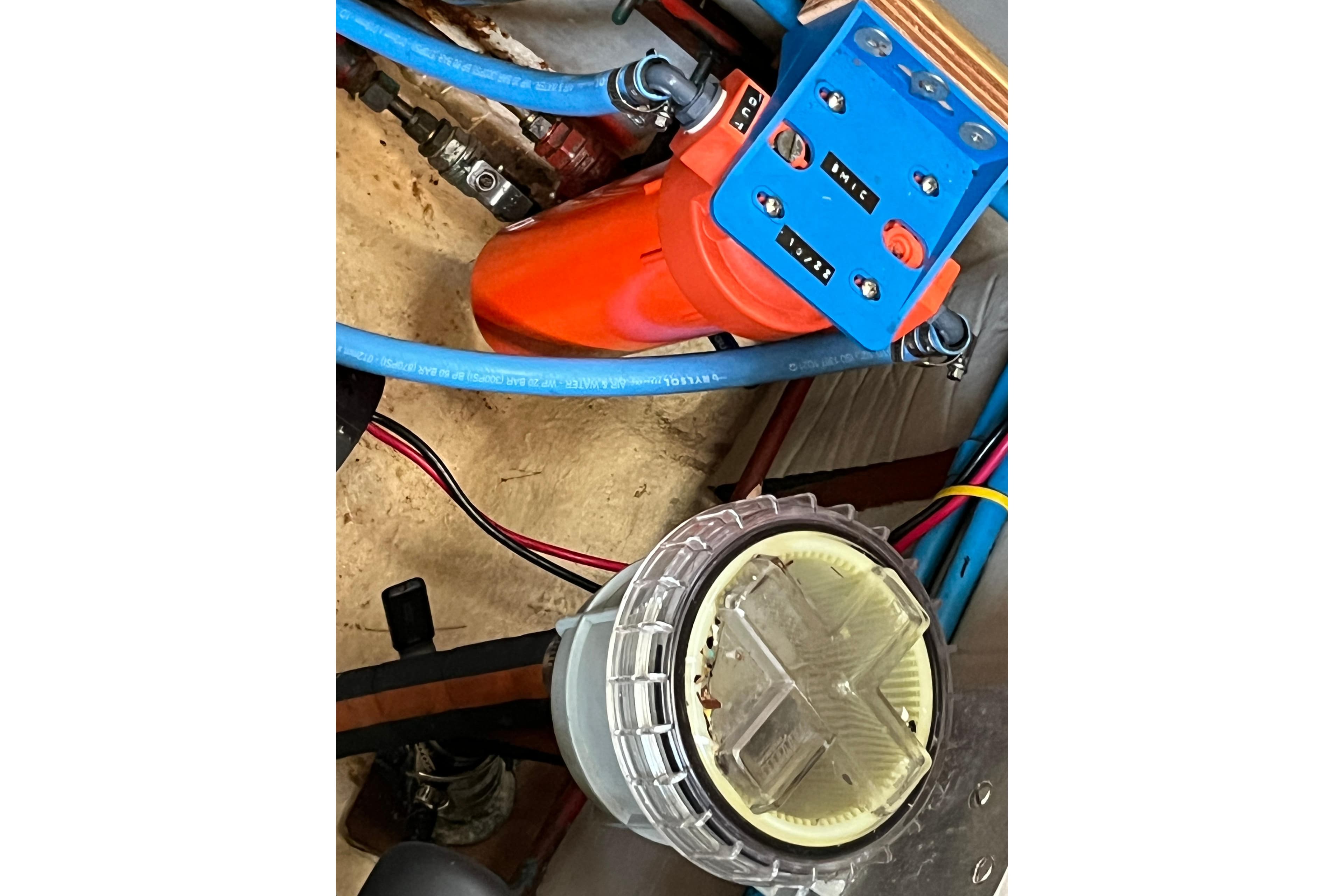 Electrical components and wiring inside a 1995 Belliure 41 boat.