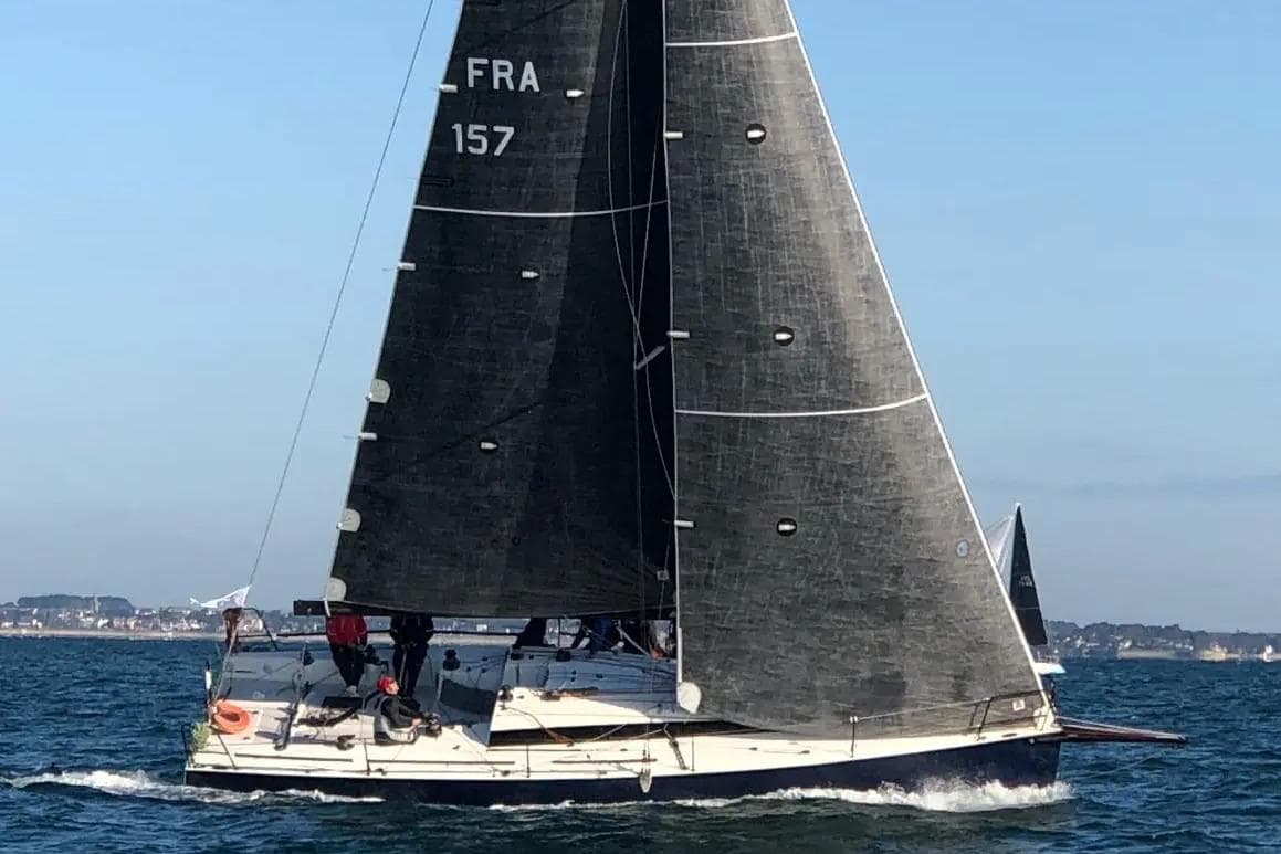 Sailing yacht JPK 11.80, 2020 model, gliding on open water.