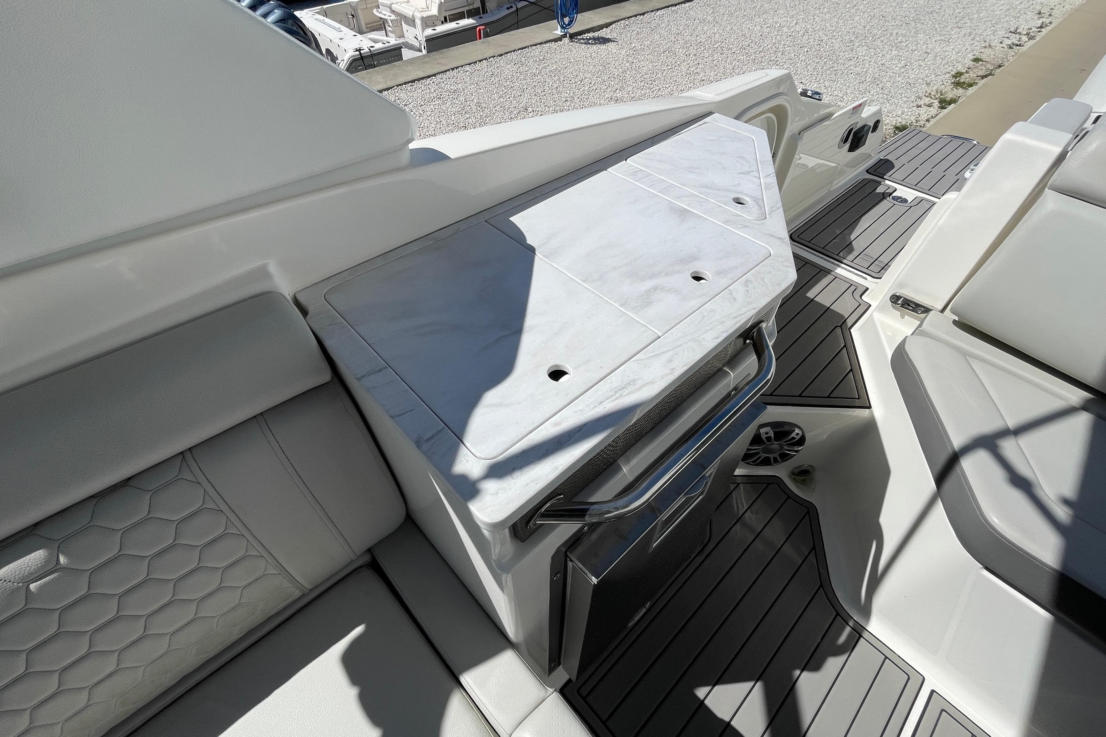 2023 Sea Ray SDX 290 Outboard interior with sleek seating and modern design.