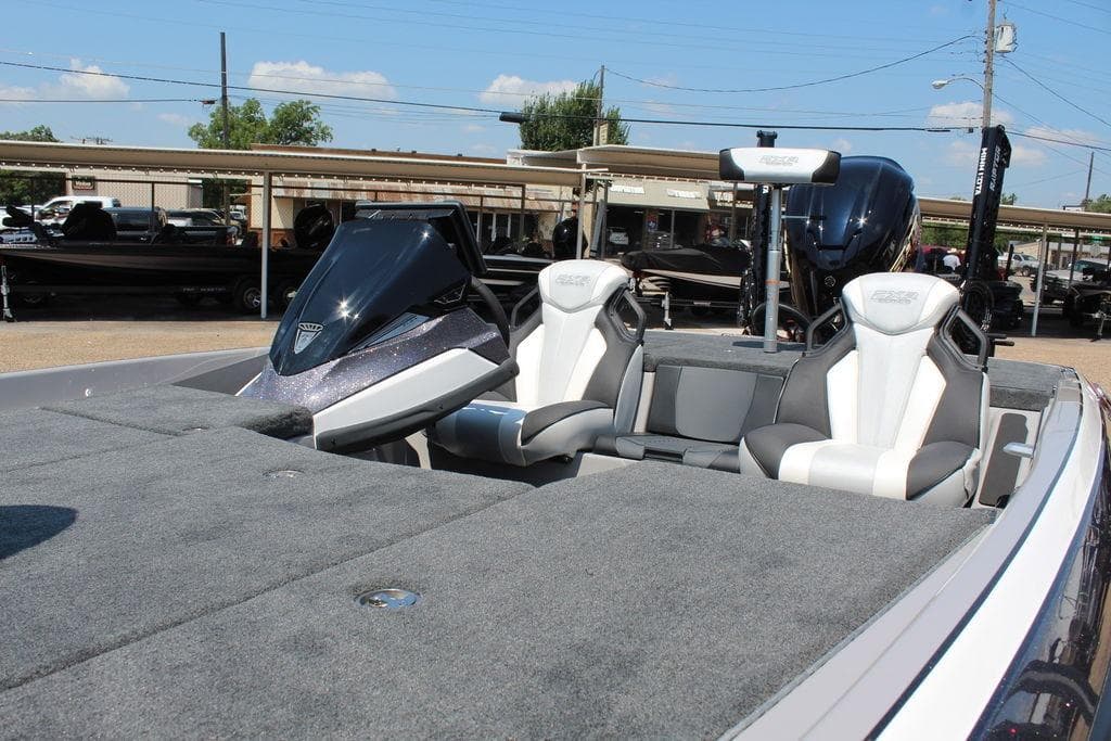 2026 Skeeter FXR20 FLEX boat interior with dual seats and sleek dashboard design.