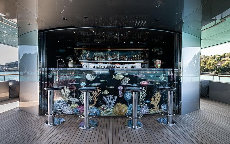 Luxurious yacht bar with marine-themed decor on Codecasa F74, 2019 model.