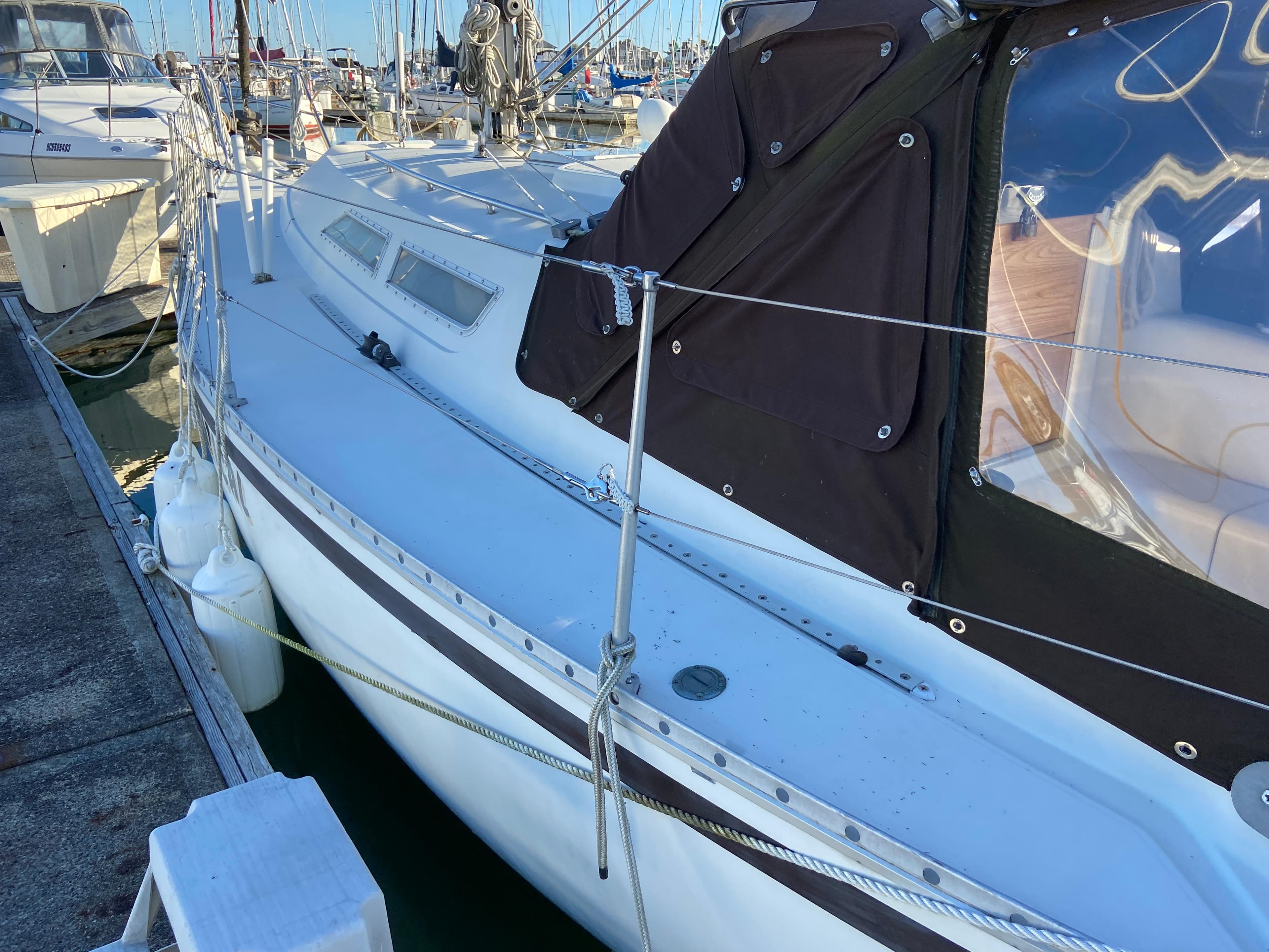 1981 CS 33 sailboat docked at marina.