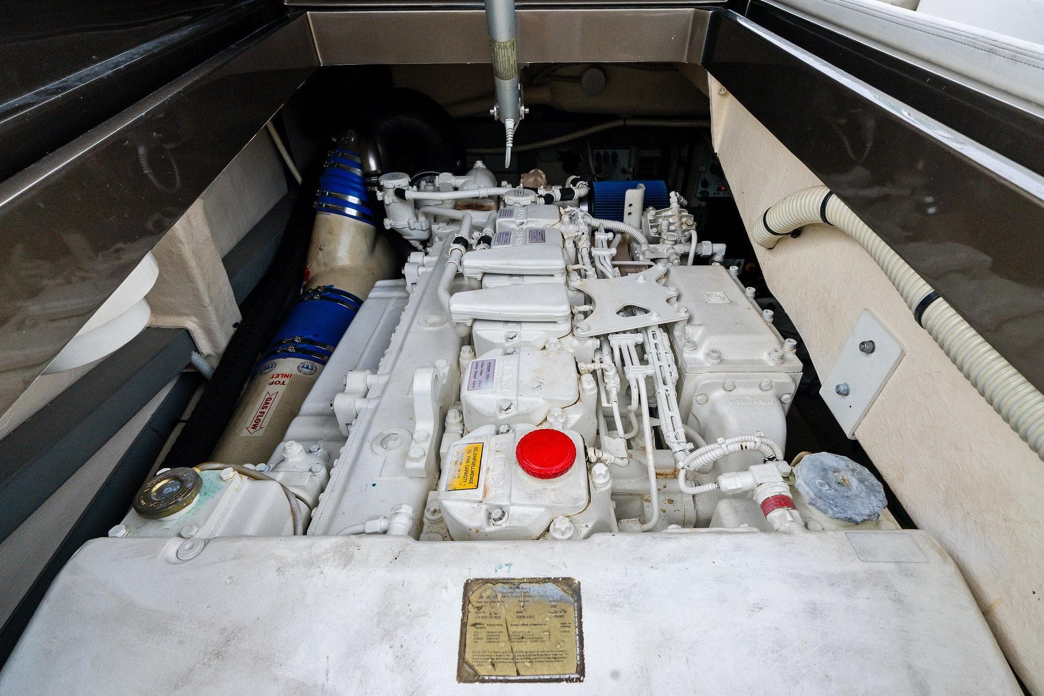 Engine compartment of a 2014 Riva Rivarama Super yacht, showcasing intricate mechanical details.
