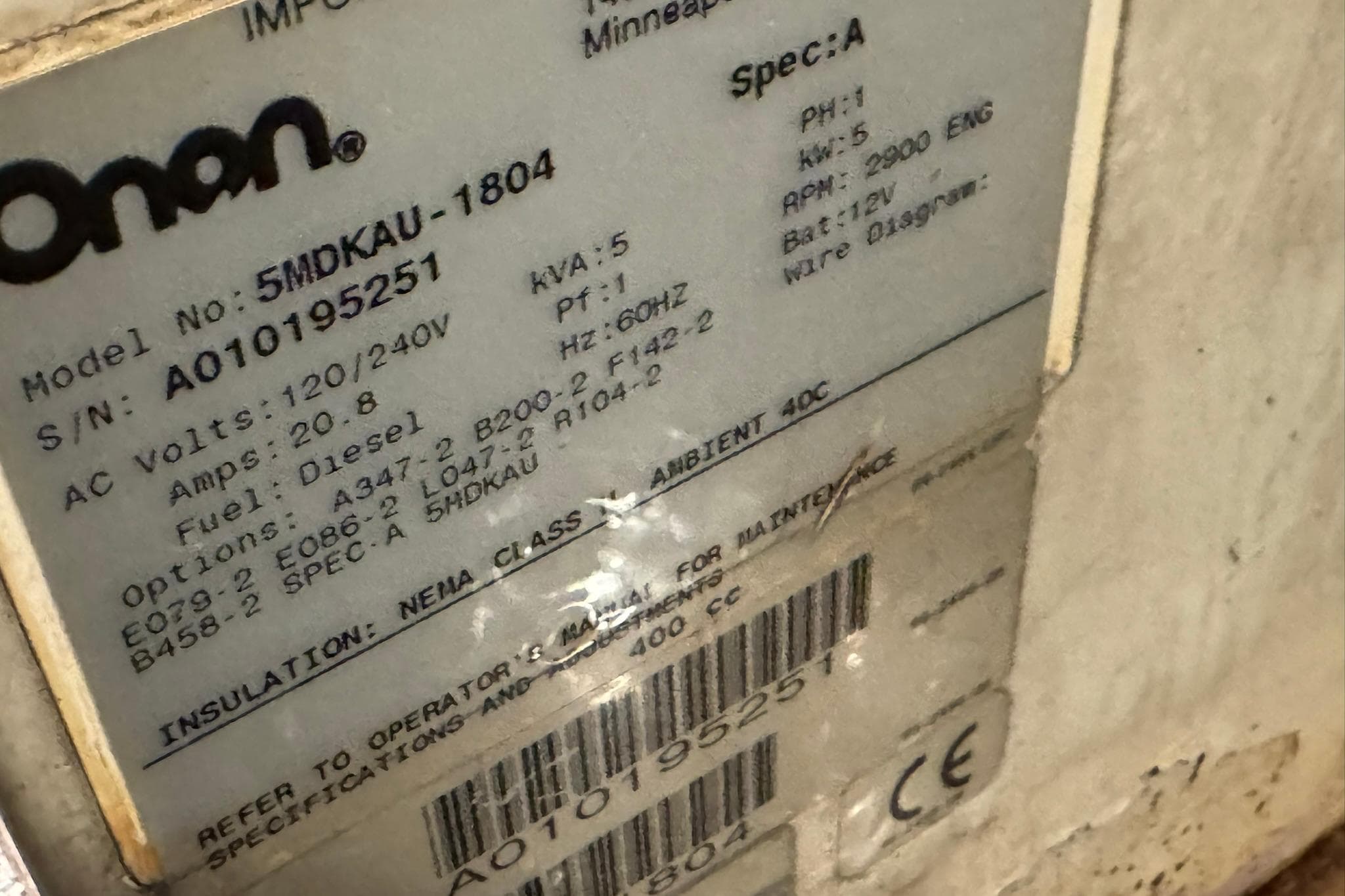 Label on Onan generator, model 5MDKAU-1804, serial A010195251, for DeFever 44, 1991.