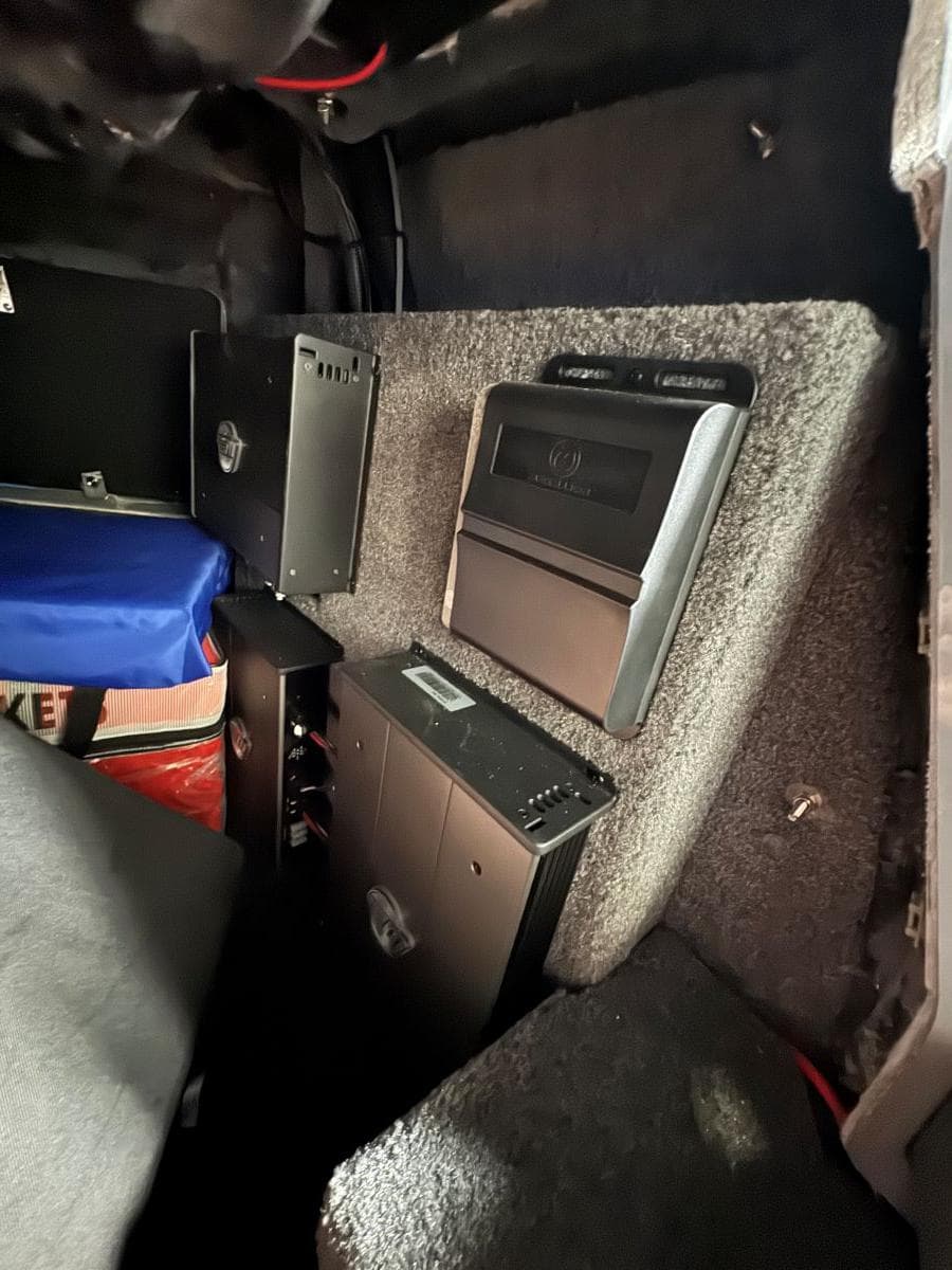 Interior view of 2022 Malibu Wakesetter 25 LSV showing audio equipment installation.