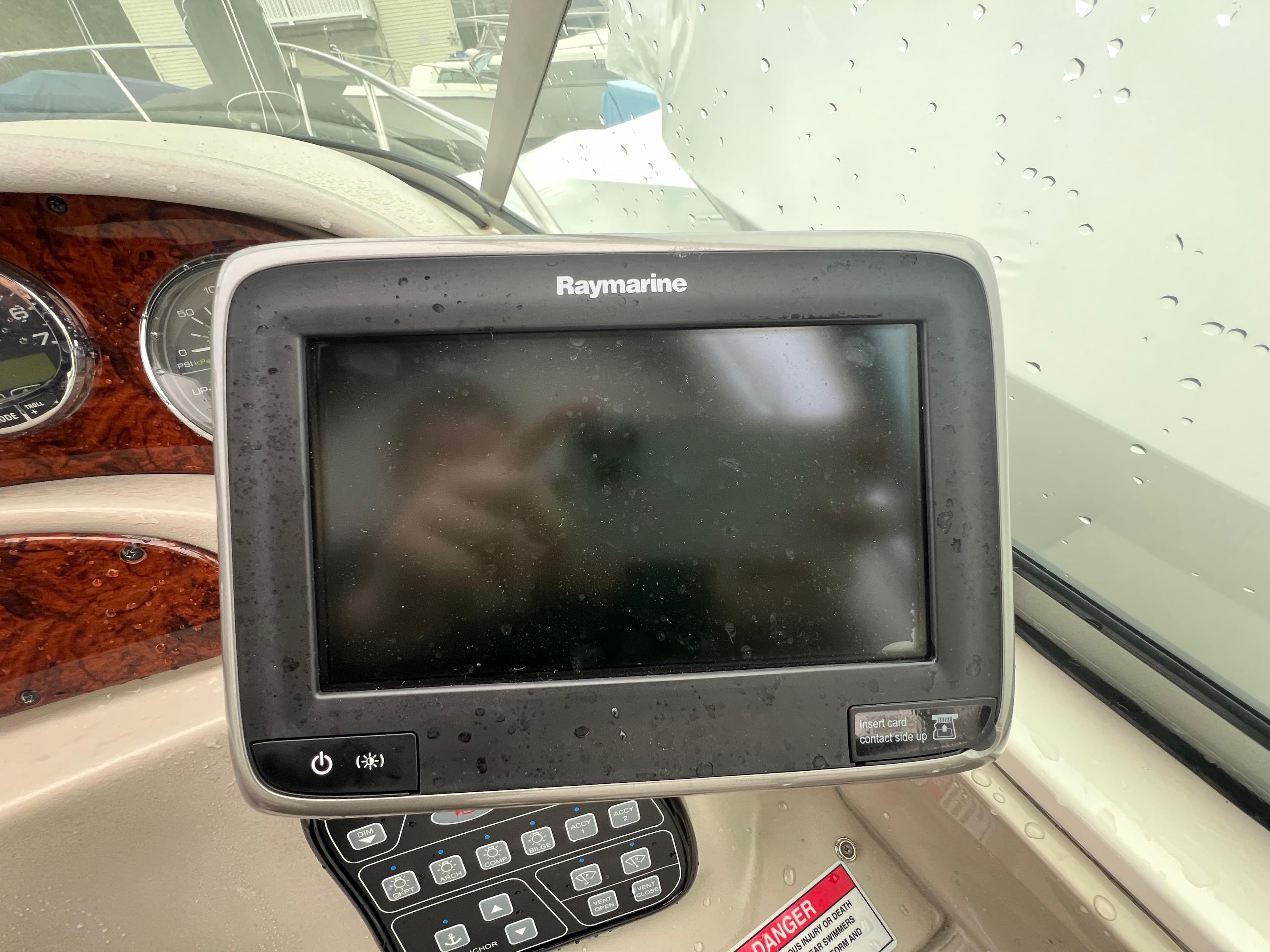 Raymarine navigation system on 2008 Sea Ray 280 Sundancer boat dashboard.