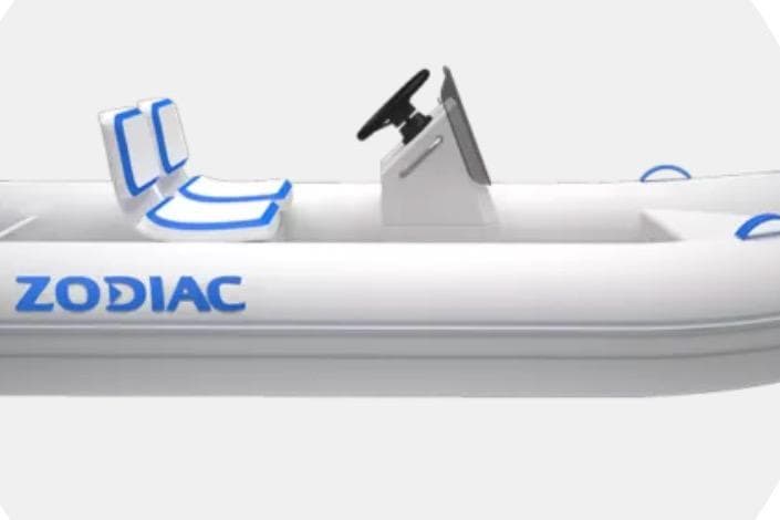 2024 Zodiac Nomad 3.9 RIB Alu boat, white with blue accents, side view.
