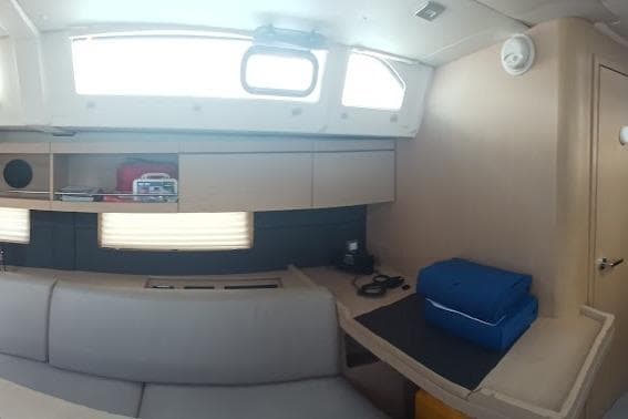 Interior of 2020 Beneteau Oceanis 46.1 yacht, featuring modern seating and storage.