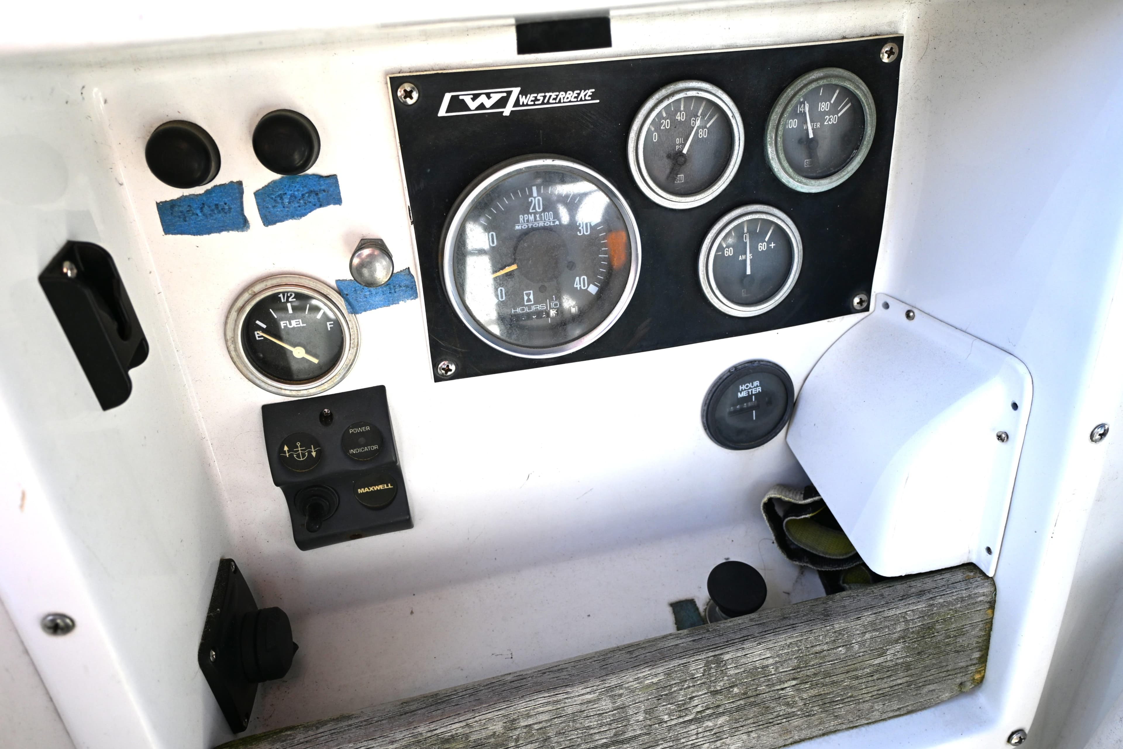 Instrument panel of a 1980 Tartan 37 sailboat with gauges and controls.