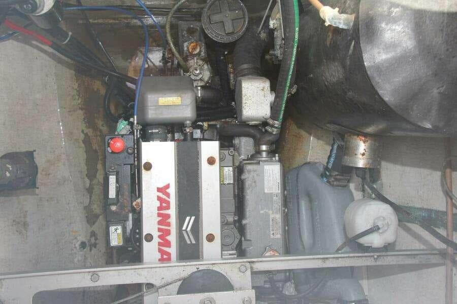 Engine compartment of a 1995 Voyage Yachts Mayotte, featuring a Yanmar engine.