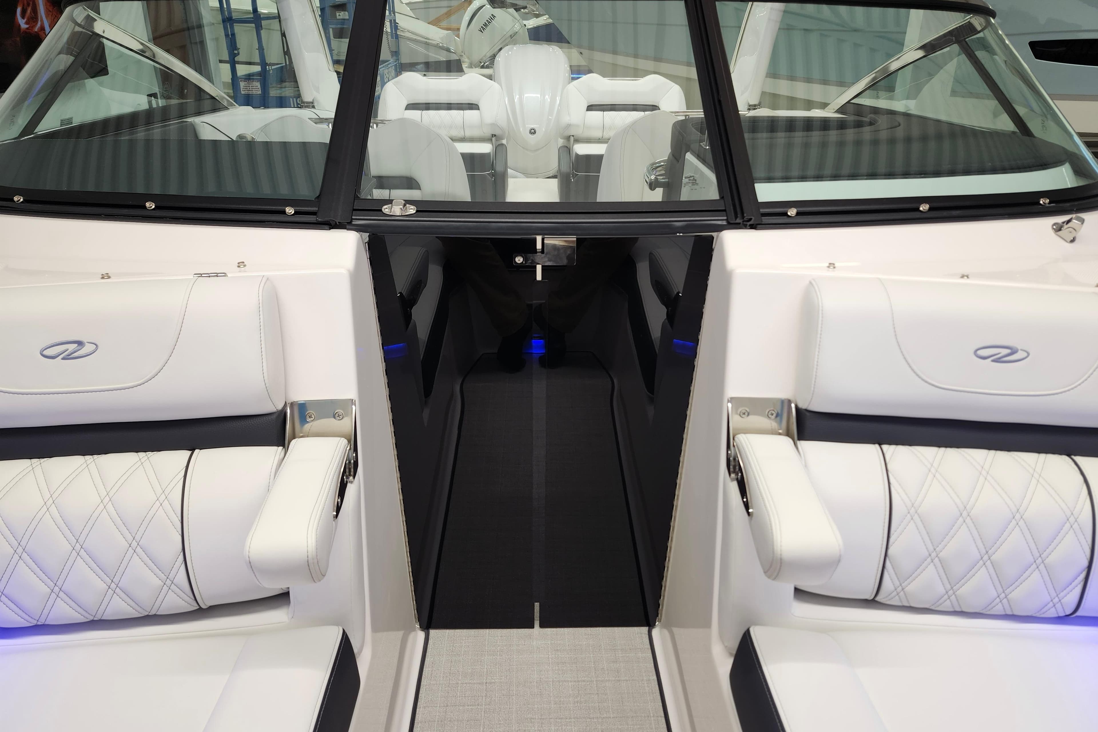 2025 Regal LX4 boat interior with white seating and modern design.