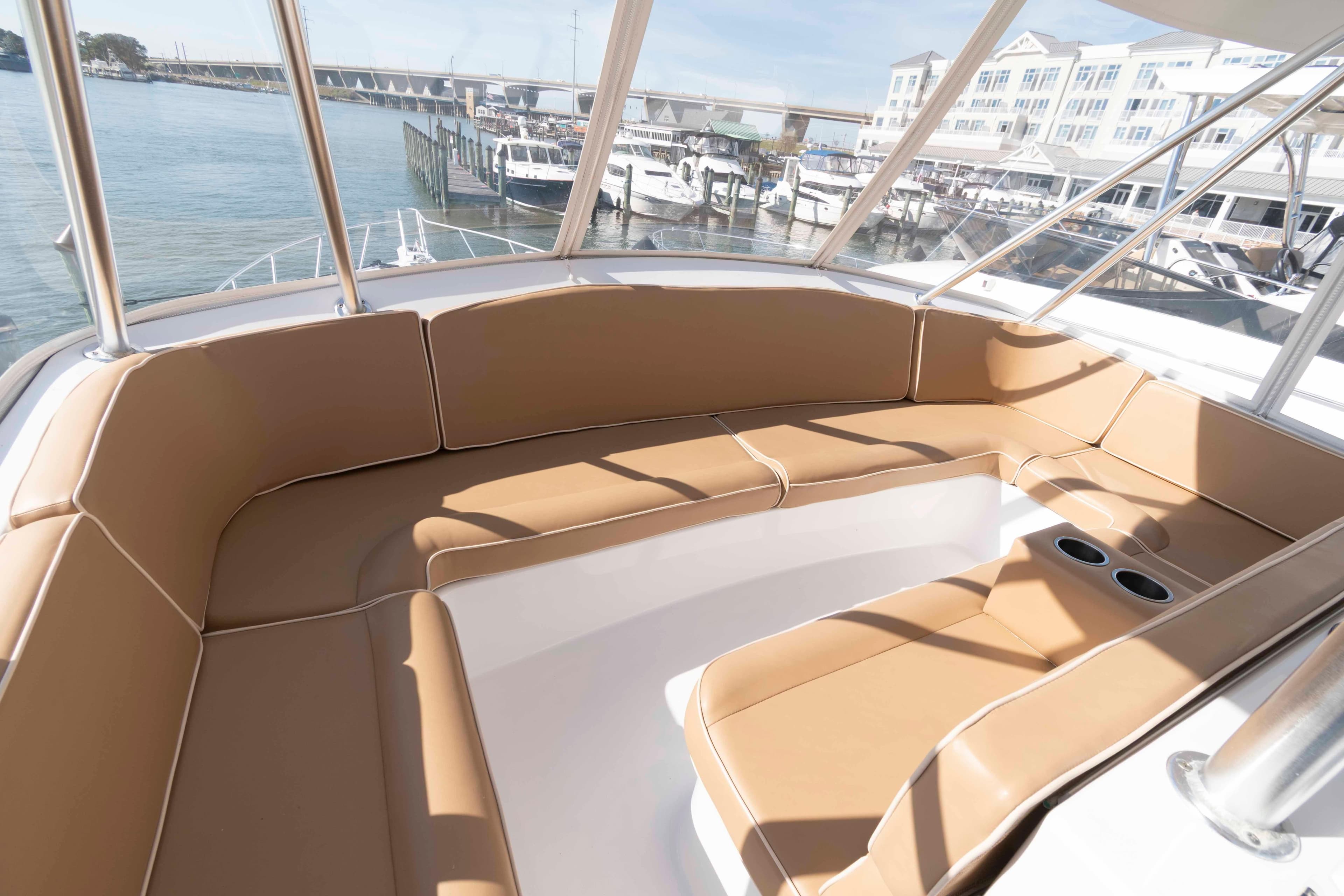 Luxurious seating area on a 1999 Ocean Yachts 60 Super Sport boat.