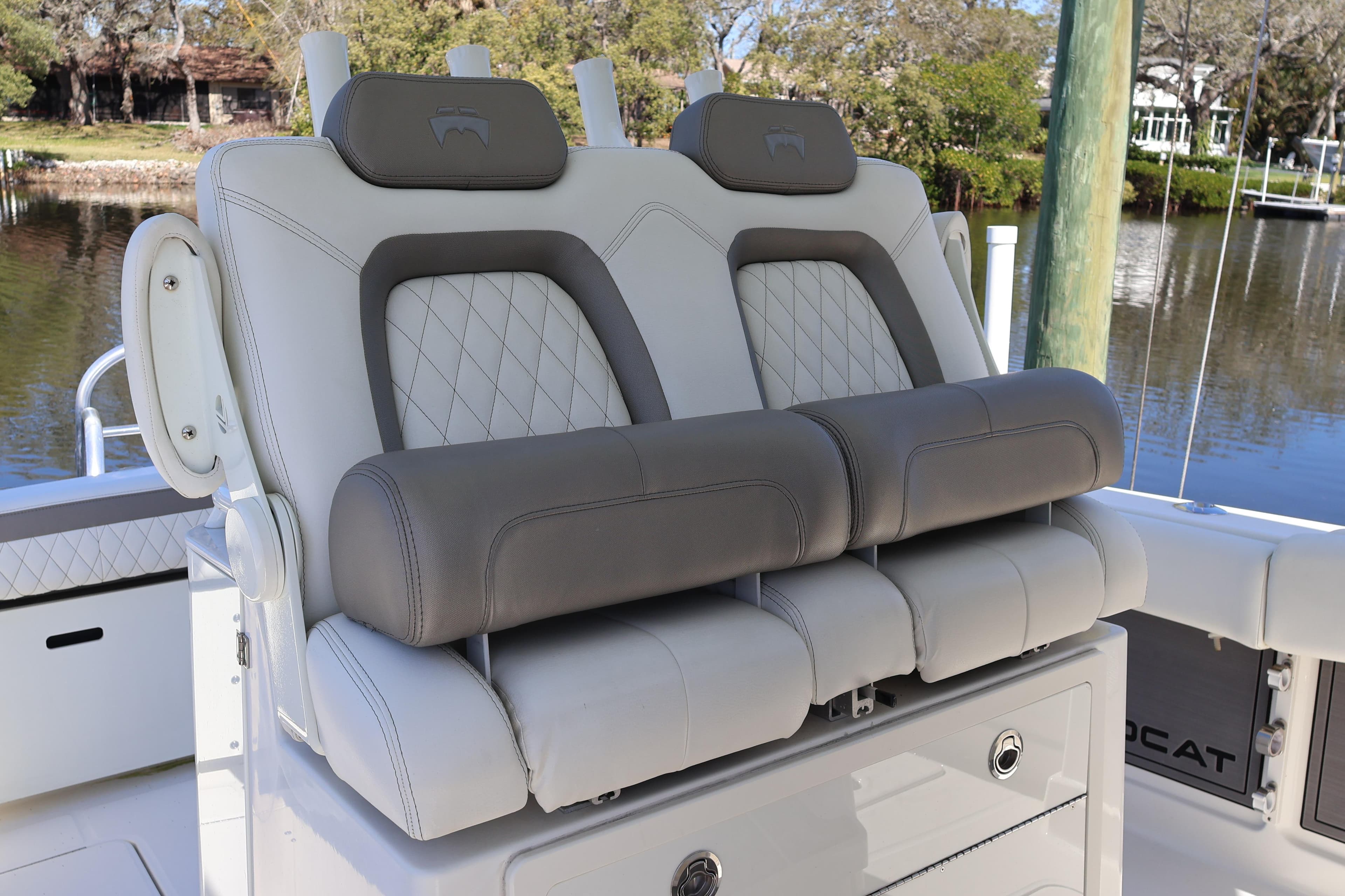 2022 World Cat 280 CC-X boat seating with luxurious gray and white upholstery.