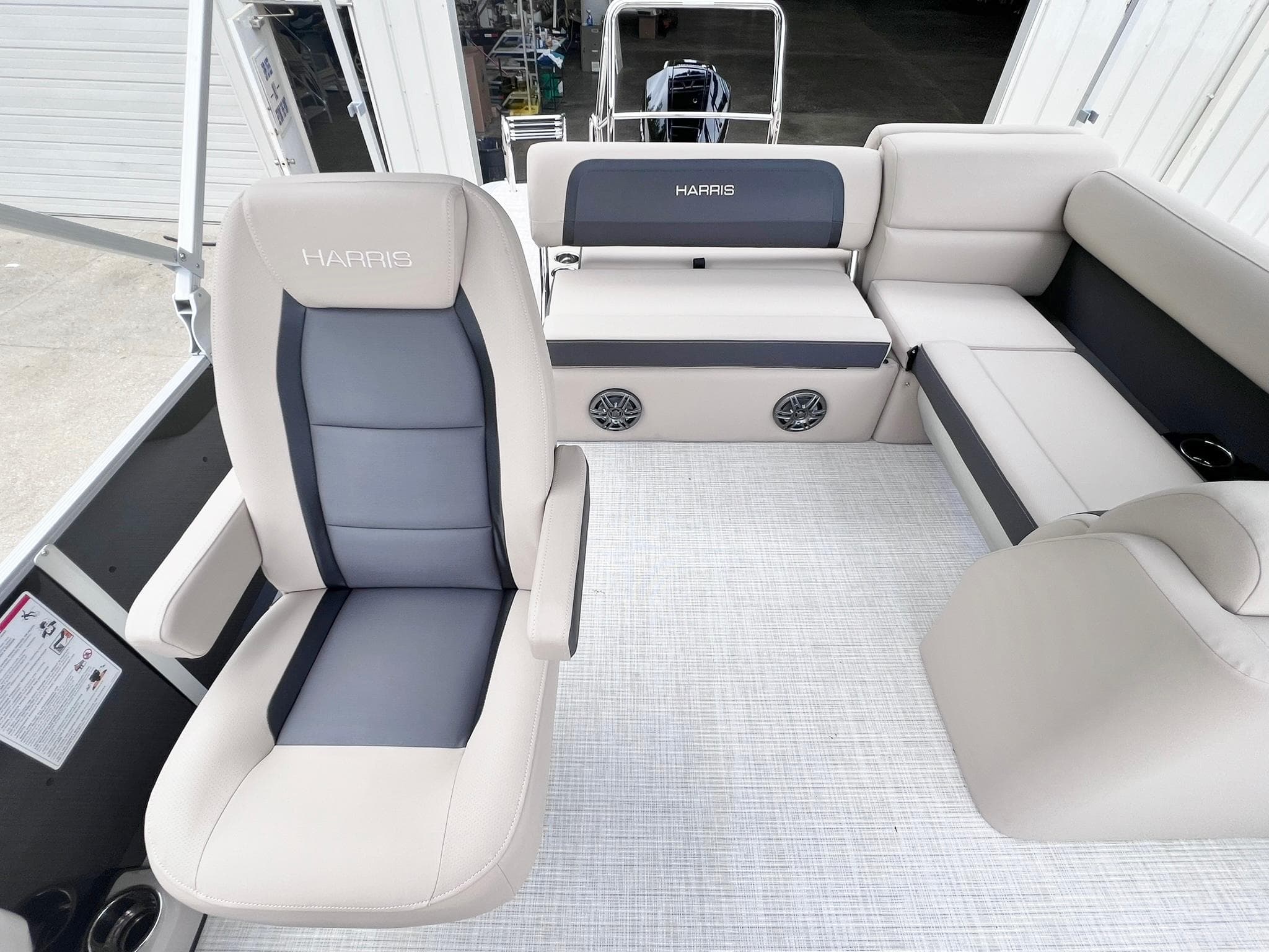 2025 Harris Cruiser 230 interior with plush seating and modern design.