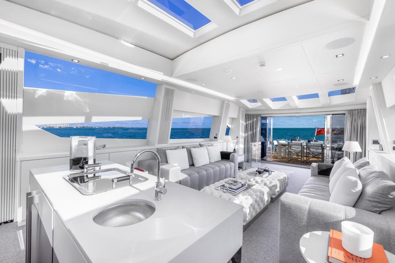 Luxurious interior of 2008 Sunseeker Predator 108 yacht with ocean view and modern furnishings.