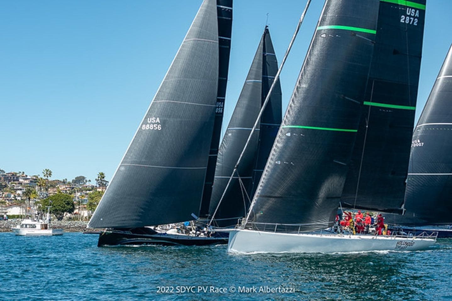 Sailboats racing in 2022 SDYC PV Race, featuring Maxi 72 model from 2012.