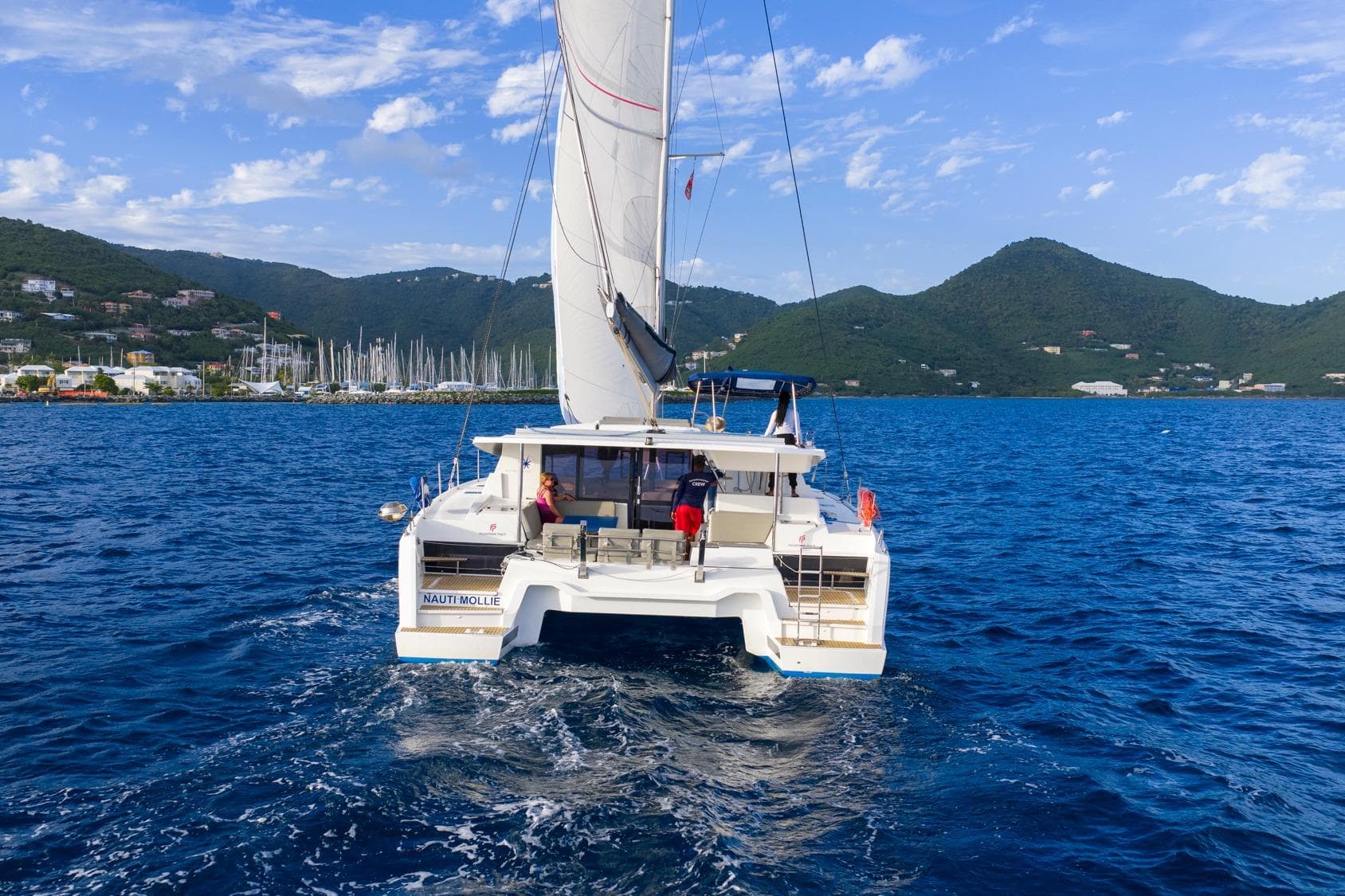 2020 Fountaine Pajot Astrea 42 Catamaran sailing in scenic coastal waters.