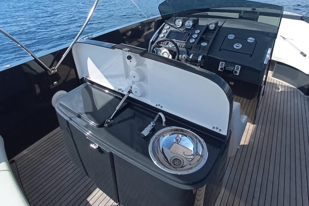 2015 Frauscher 1017 boat interior with sleek dashboard and modern sink.