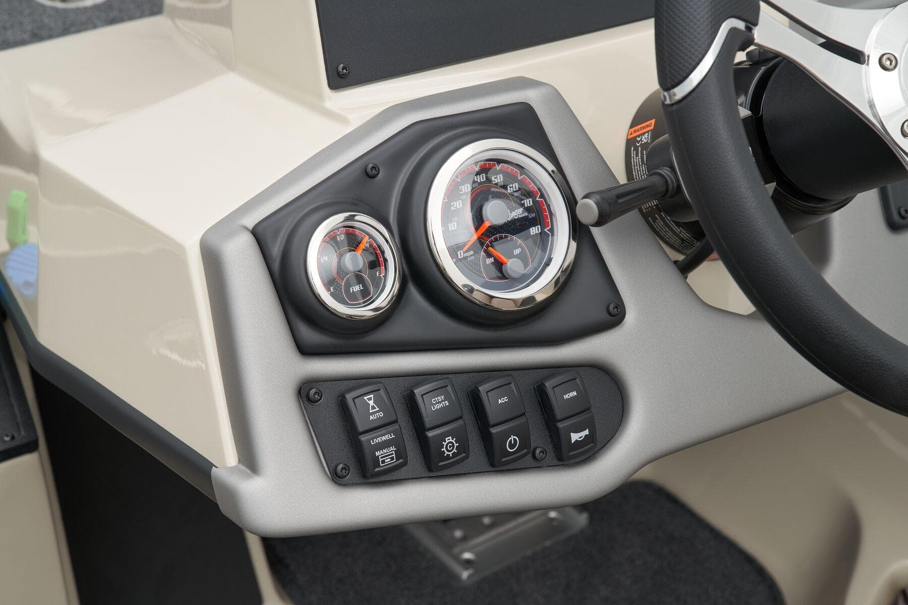 Manufacturer Provided Image: Dashboard of 2026 Ranger Z185 boat with gauges and control switches.