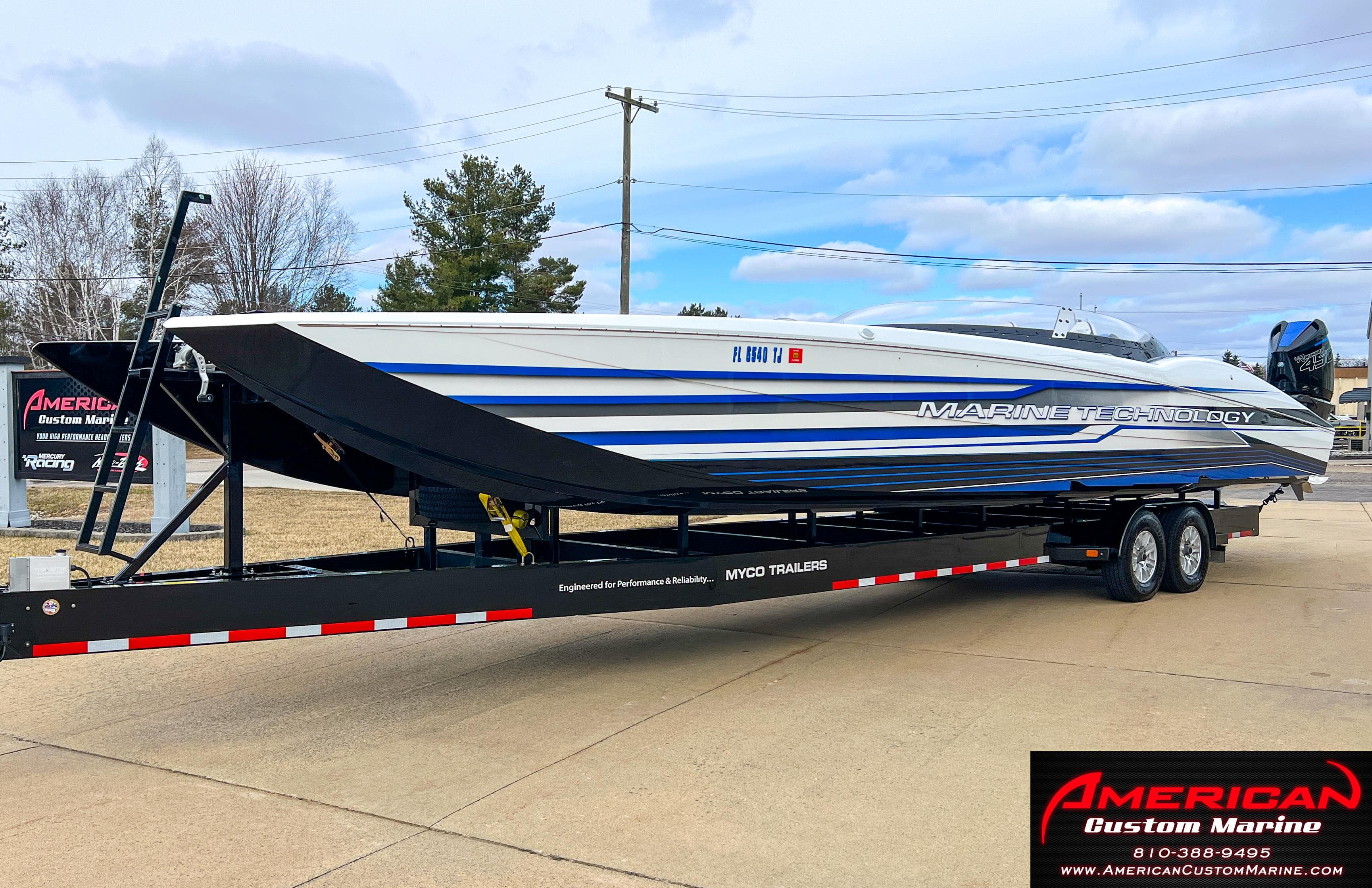 2022 MTI 390X boat on trailer at American Custom Marine.