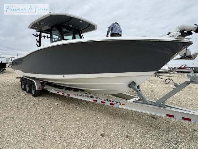 2022 Crevalle 33 CSF boat on trailer, displayed outdoors.