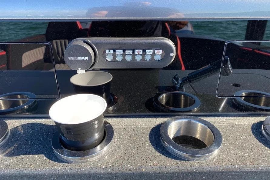 Cocktail dispenser on 2021 Concept 44' Open Deck boat with cup holders.