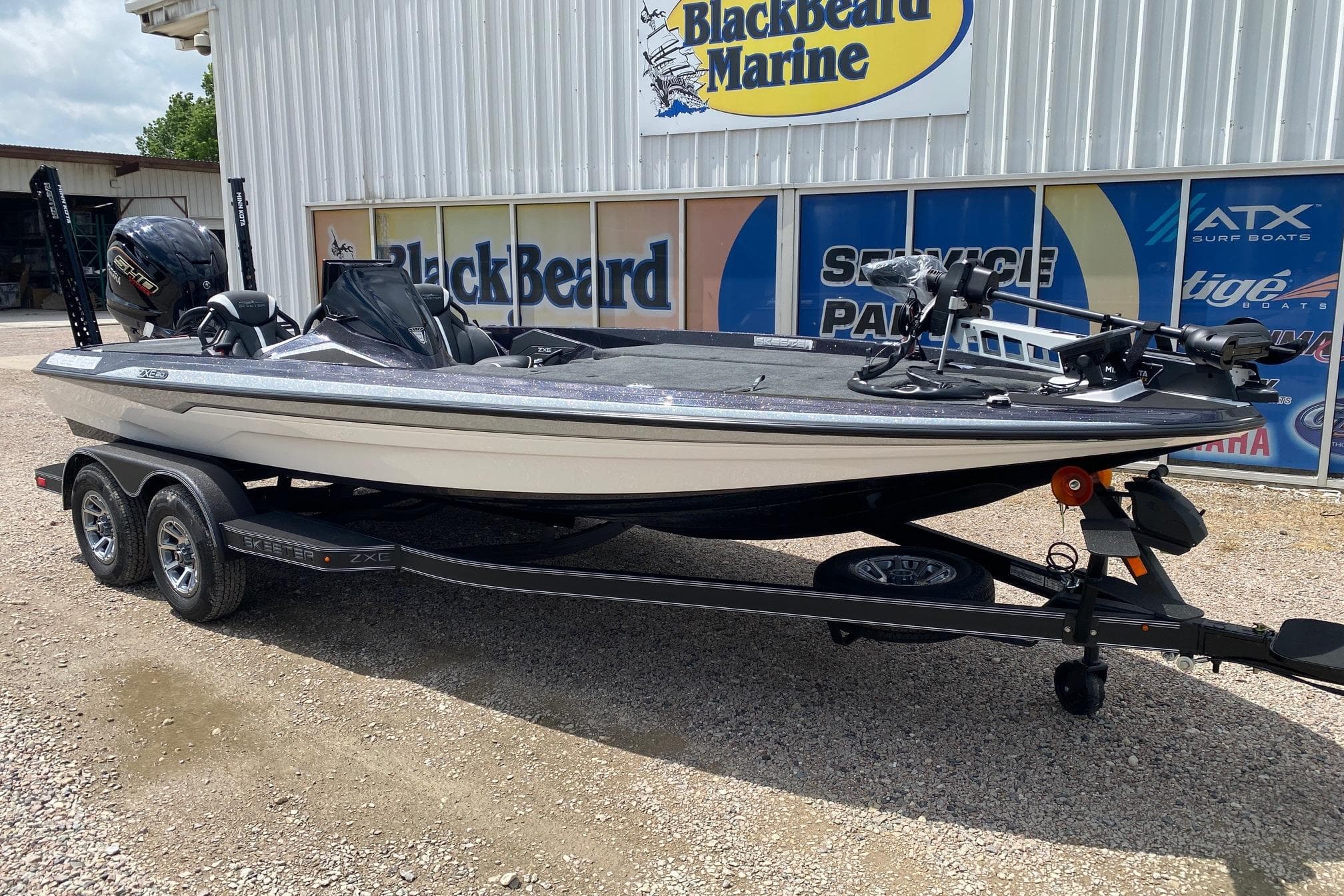2026 Skeeter ZXE20 boat on trailer at BlackBeard Marine dealership.
