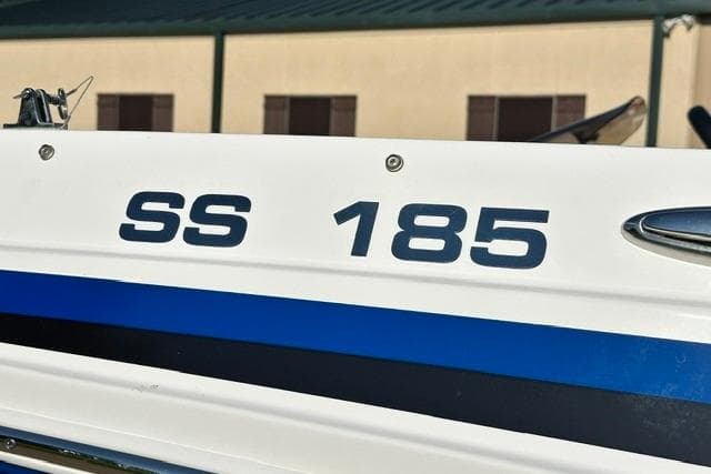2021 Hurricane SunDeck Sport 185 OB boat with "SS 185" marking on the side.