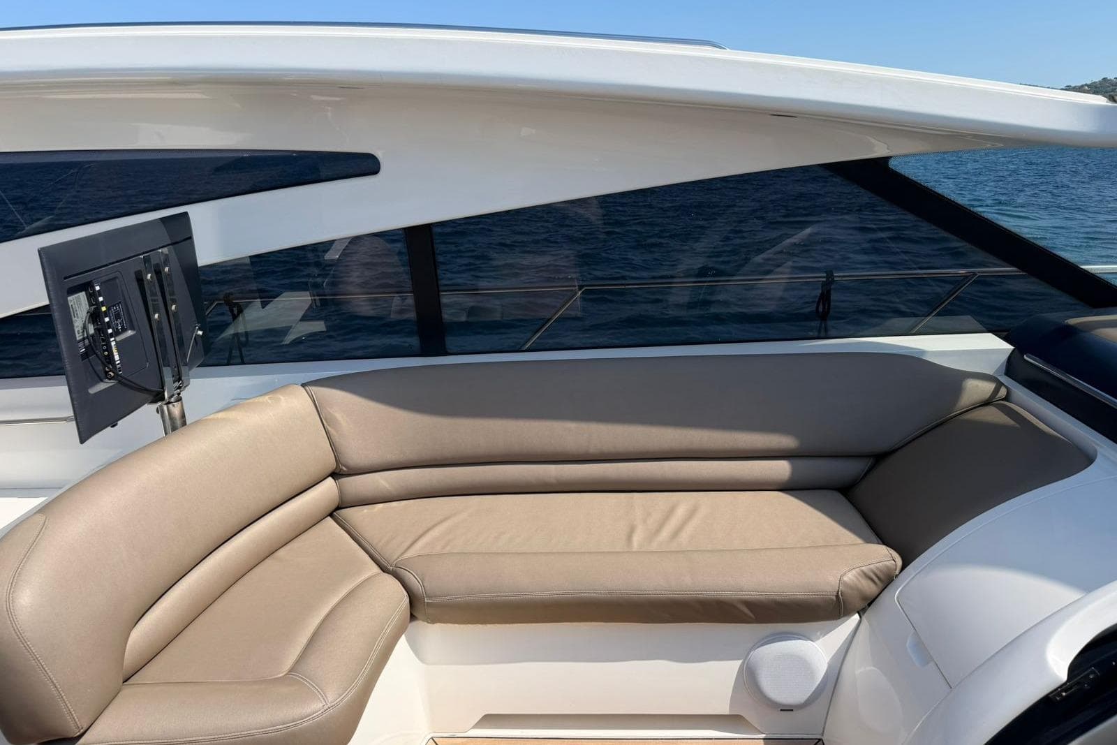 Luxurious seating area on a 2003 Princess V58 yacht with ocean view.