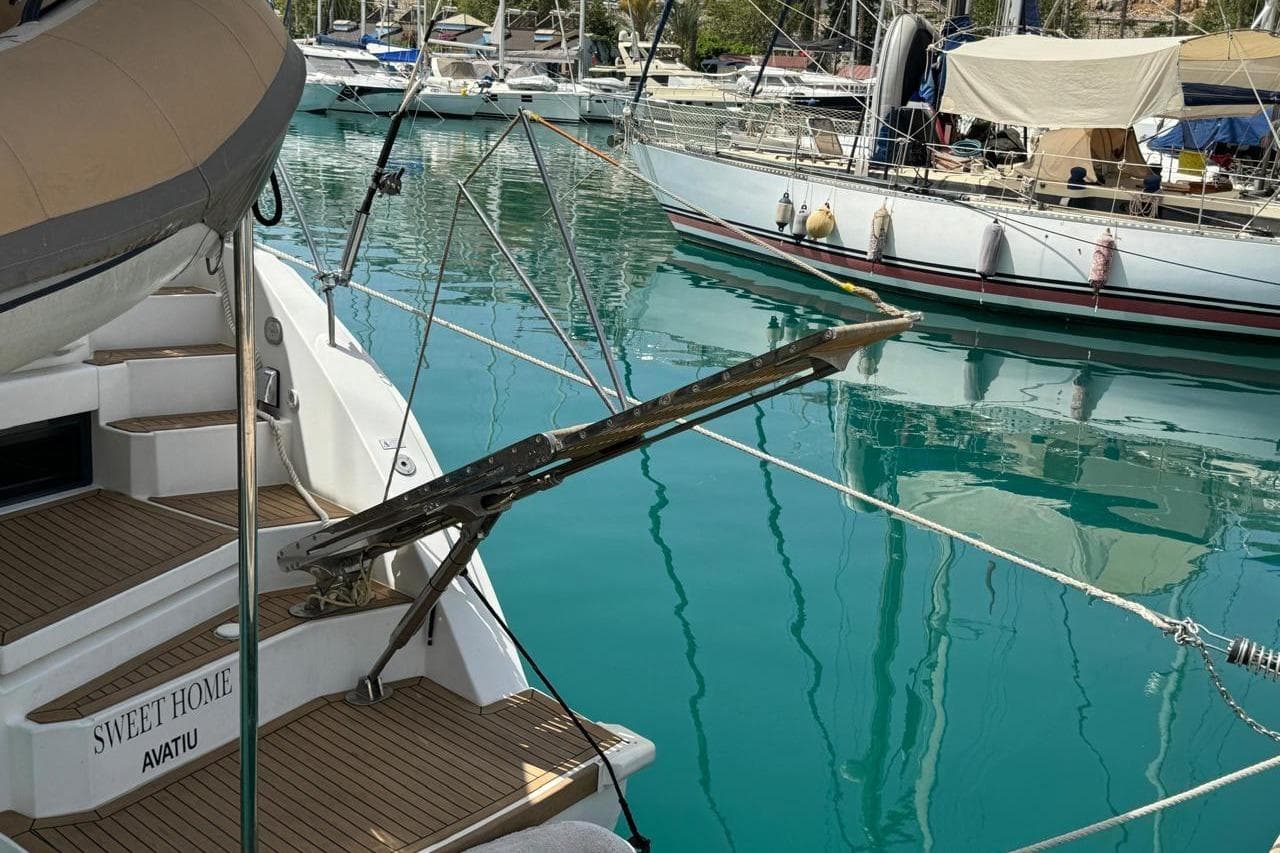 Leopard 45 catamaran docked in marina, turquoise water, 2019 model.