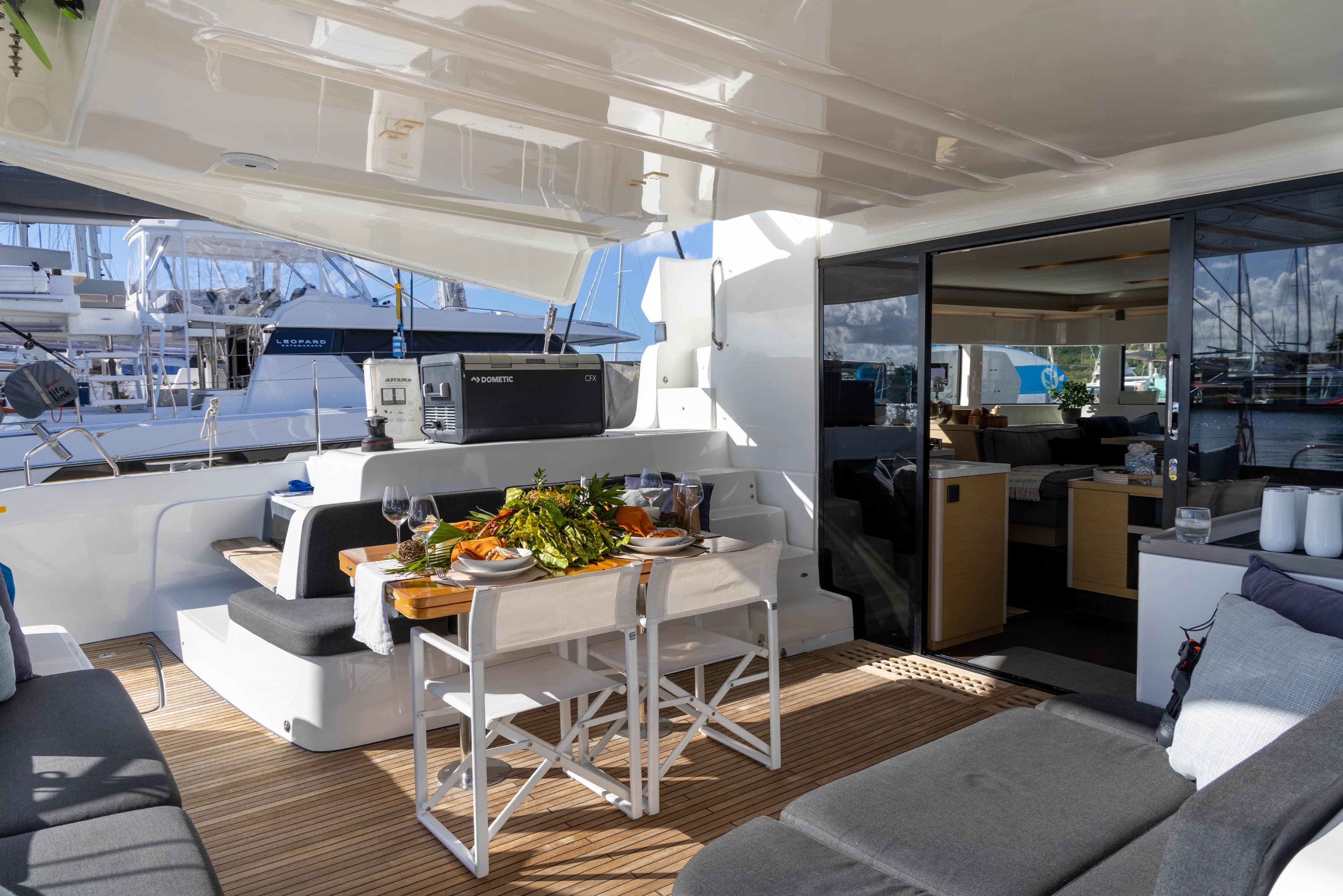 Luxurious 2021 Lagoon 50 yacht interior with elegant dining setup and modern amenities.