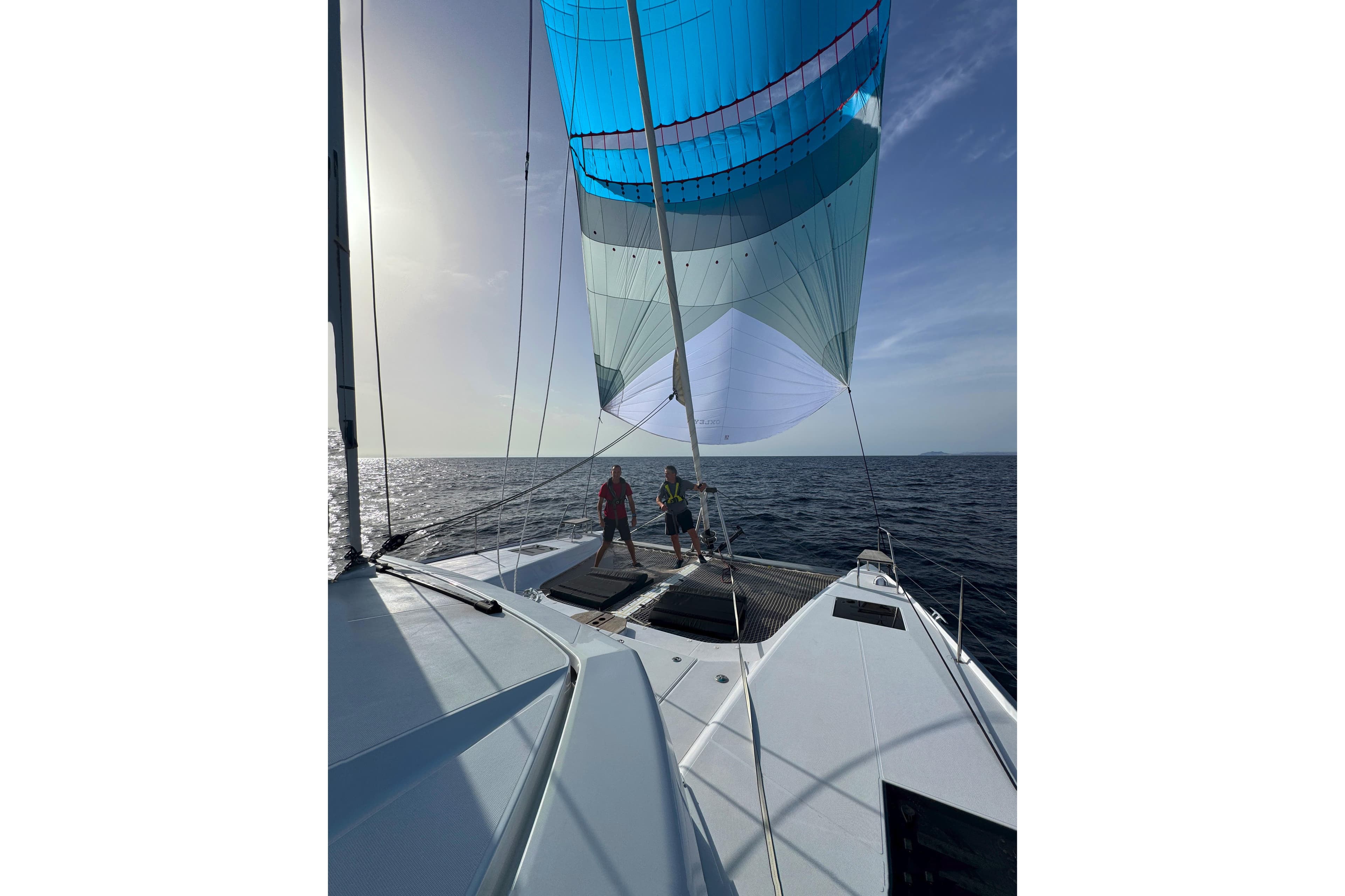 2024 Nautitech 44 Open sailing on open sea with vibrant spinnaker.