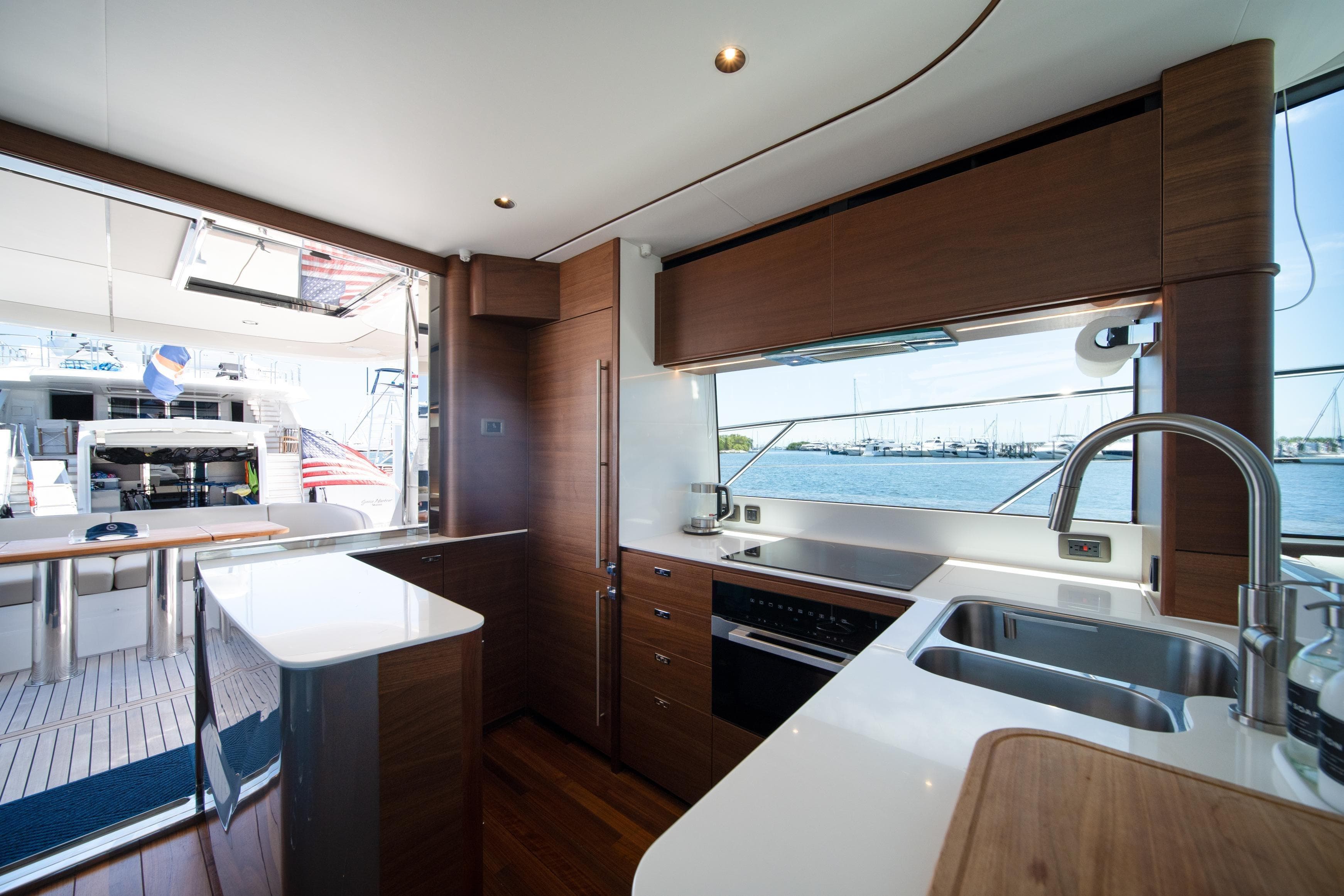 Luxurious 2025 Princess F65 yacht kitchen with modern amenities and ocean view.