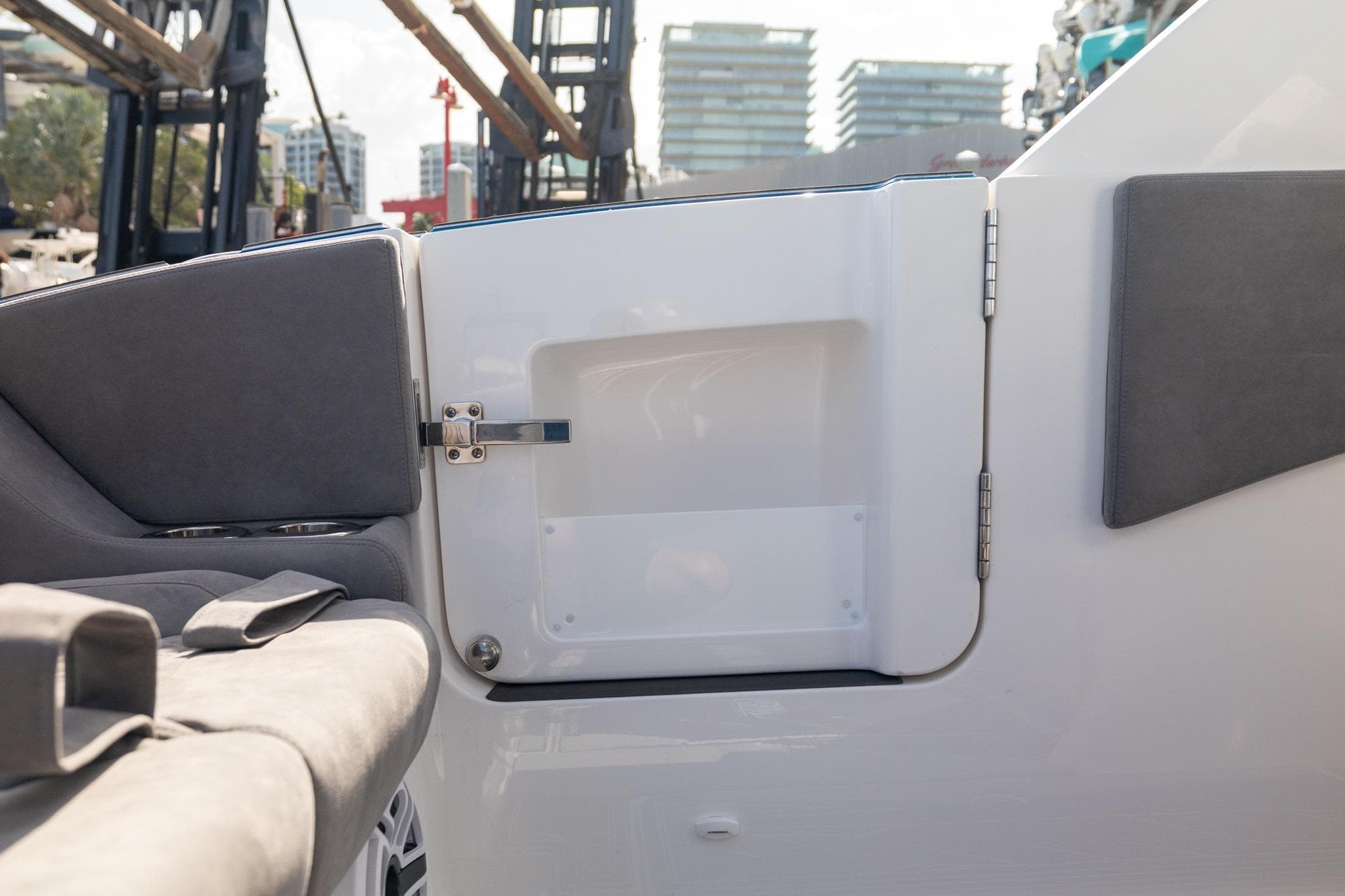Interior view of 2027 Deep Impact 449 Sport boat, featuring sleek seating and modern design.