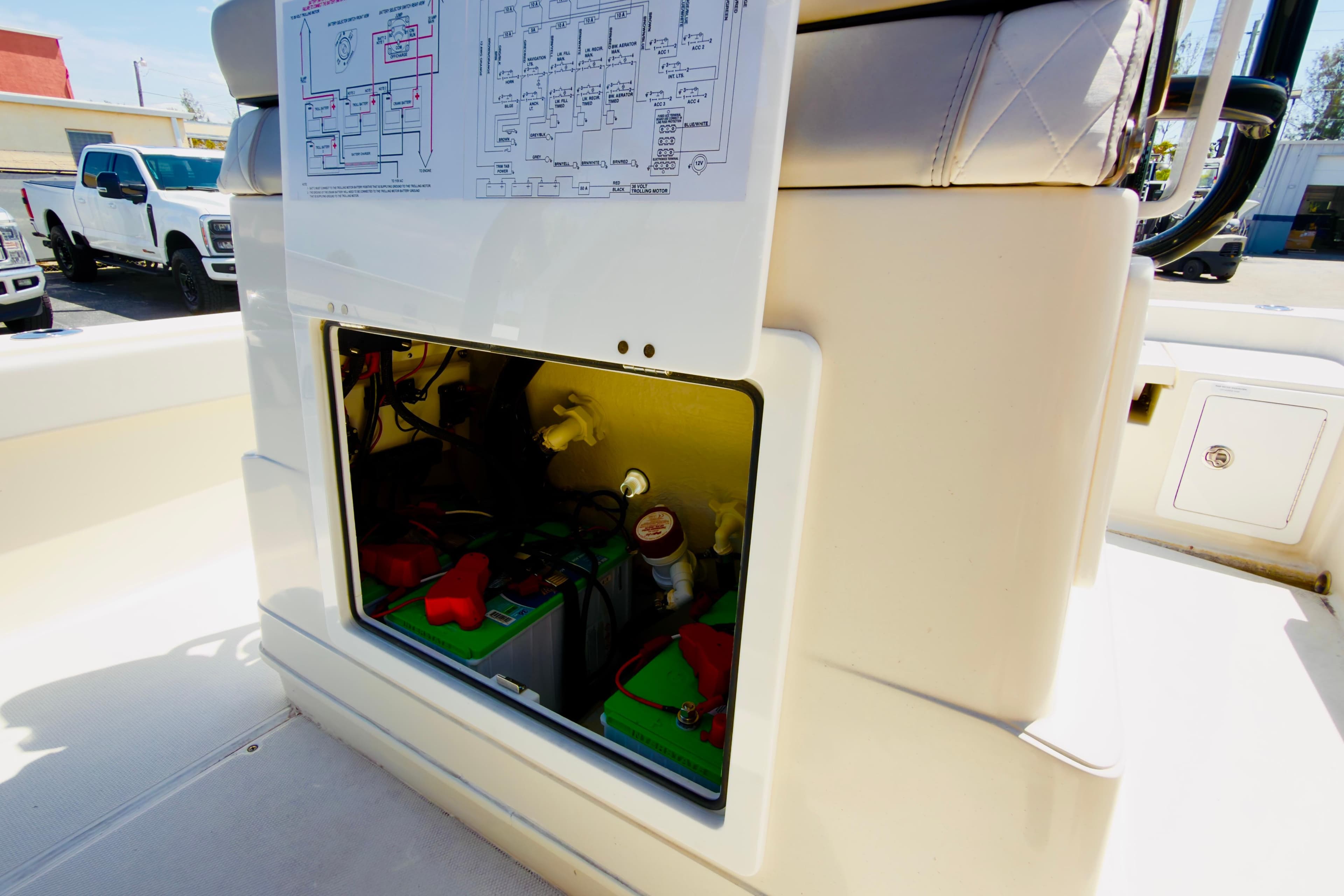2024 Ranger 2660 Bay boat console with open storage compartment and wiring diagram.