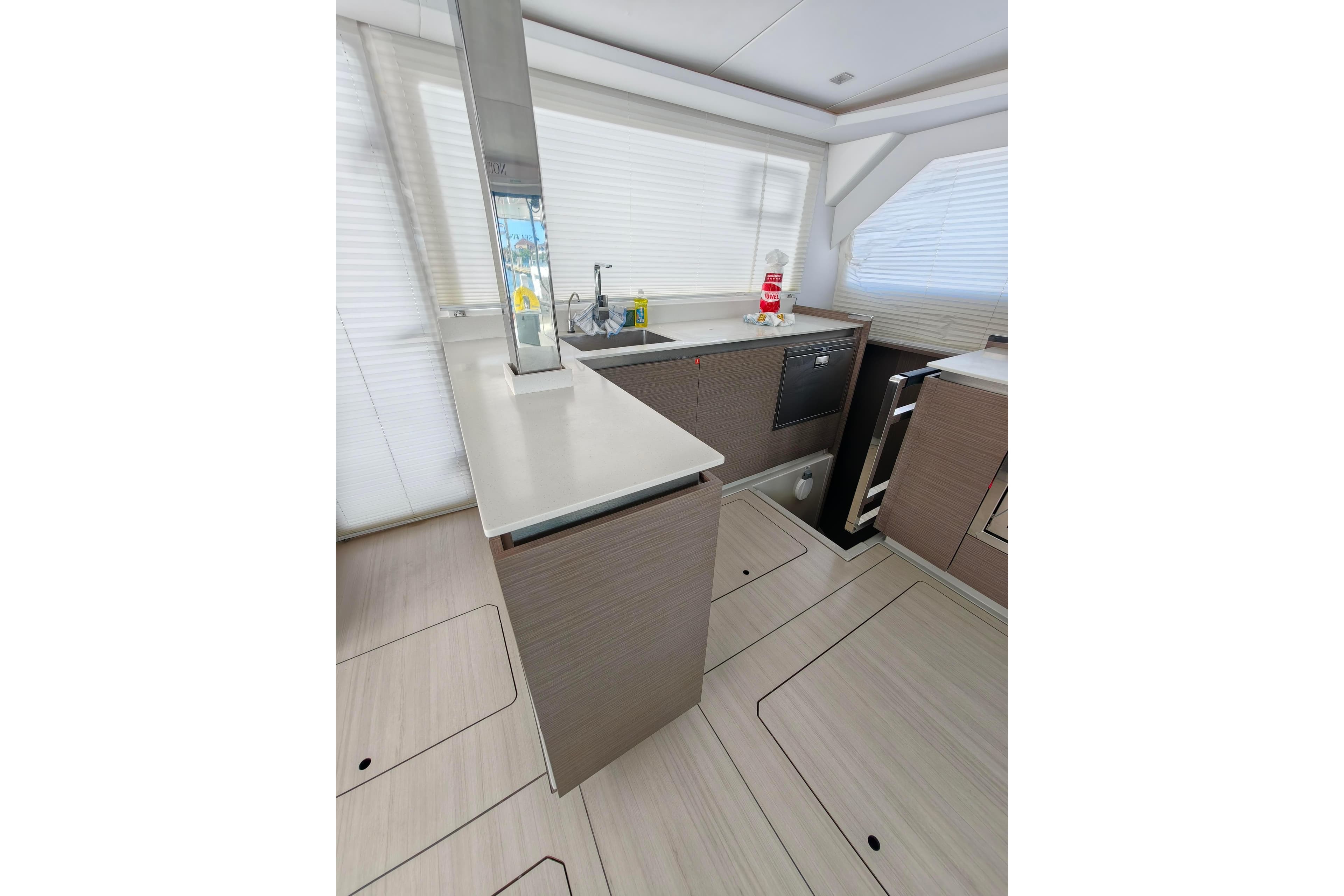 Modern kitchen interior of 2021 Leopard 50 yacht with sleek countertops and appliances.