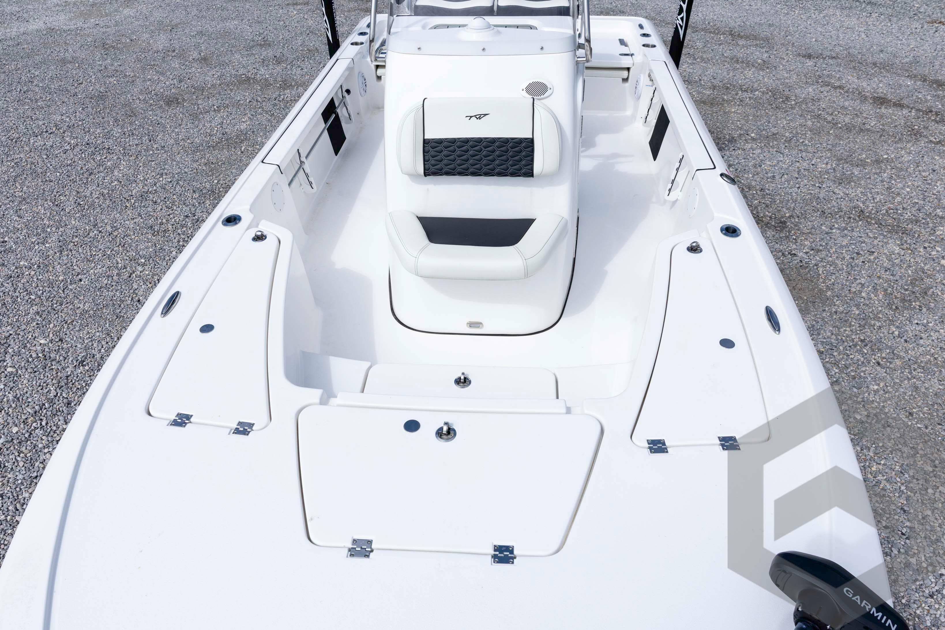 2026 Tidewater 2110 Bay Max boat with sleek white deck and seating.
